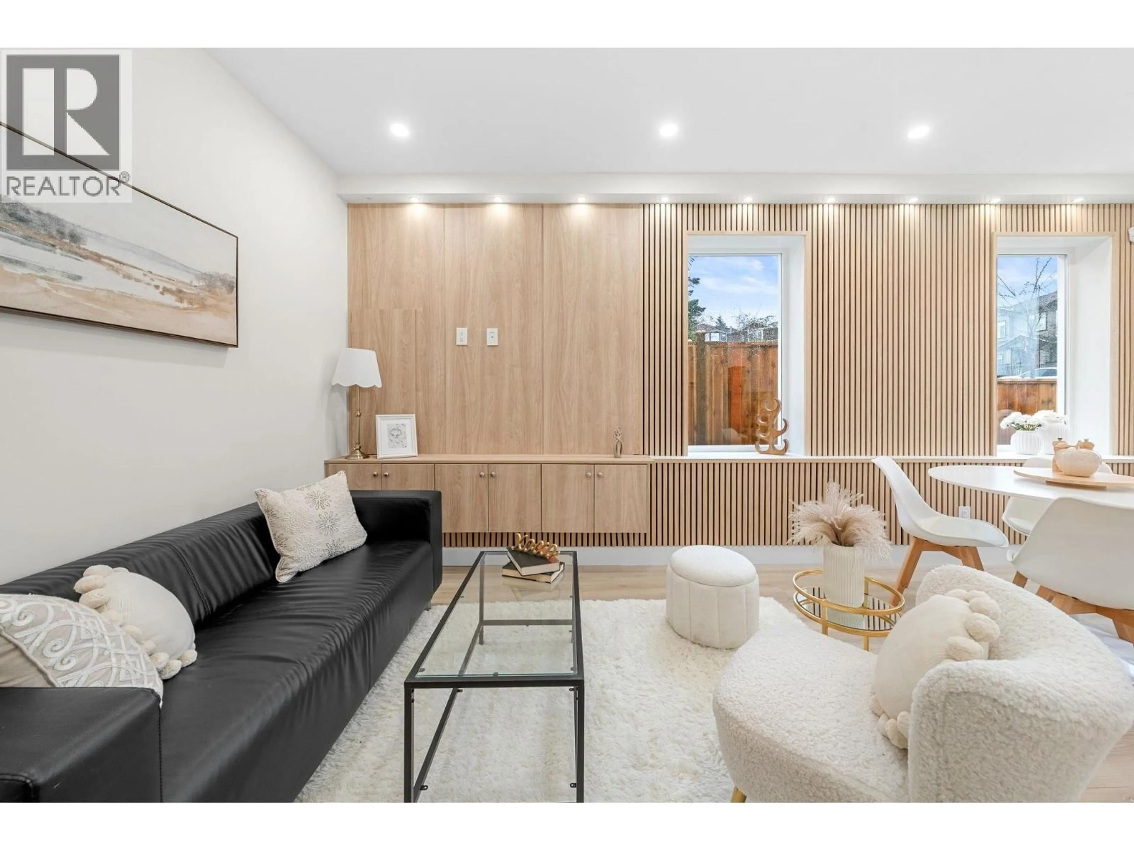 Living room with furniture, wood/laminate floor for 4 - 3581 HAIDA DRIVE, Vancouver British Columbia V5M3Y9