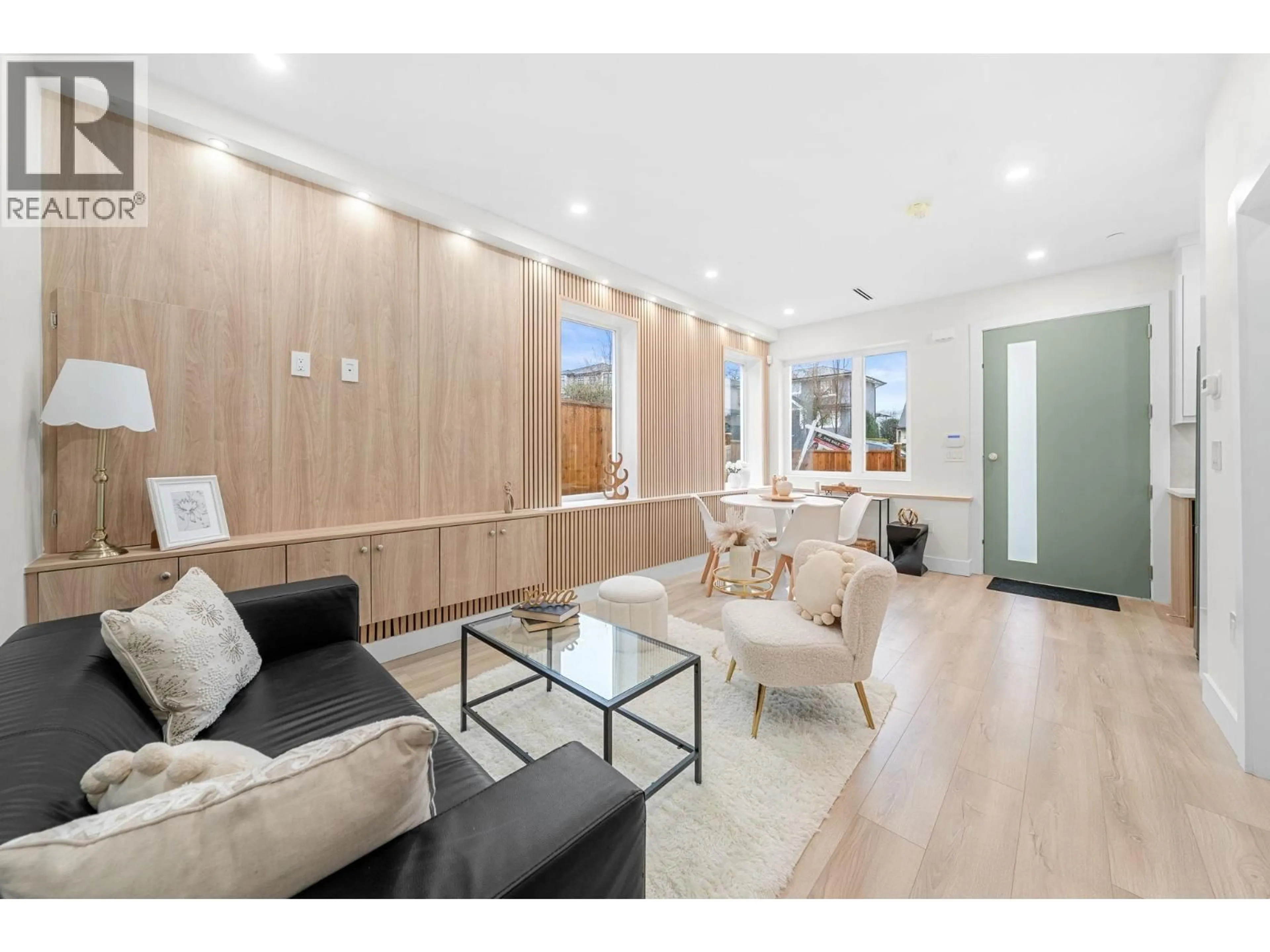Living room with furniture, wood/laminate floor for 4 - 3581 HAIDA DRIVE, Vancouver British Columbia V5M3Y9