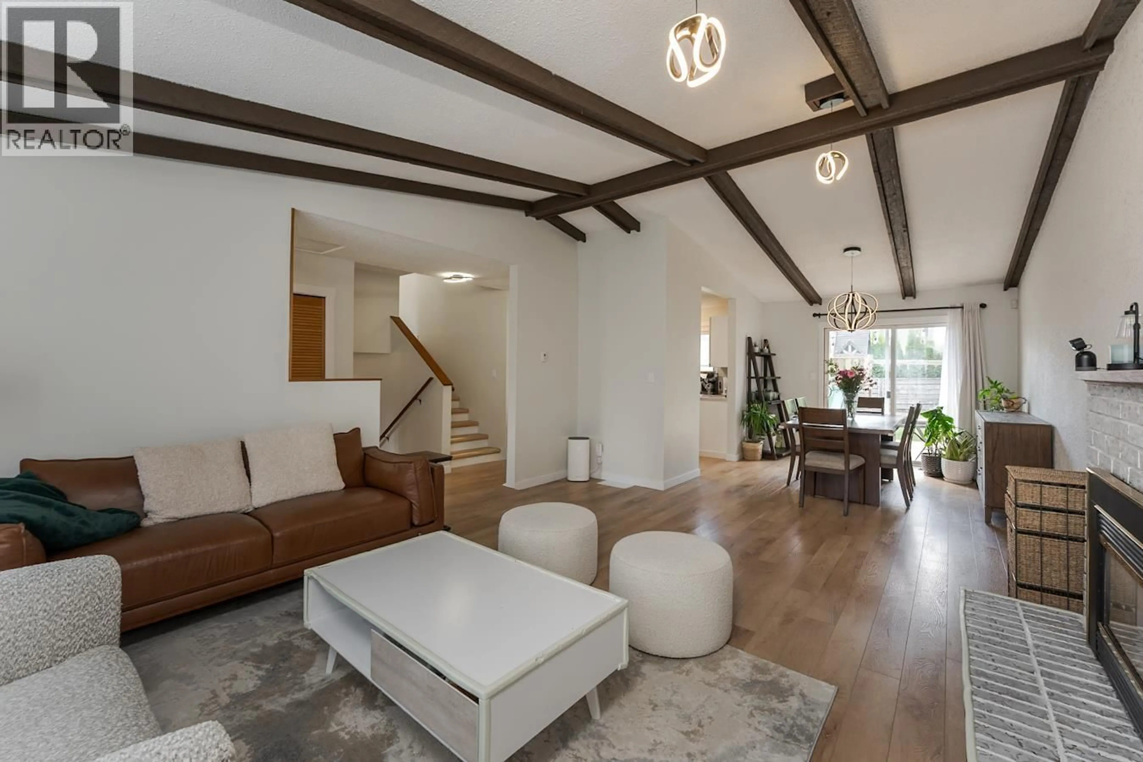 Living room with furniture, wood/laminate floor for 1575 BUCHANAN AVENUE, Prince George British Columbia V2L4X8