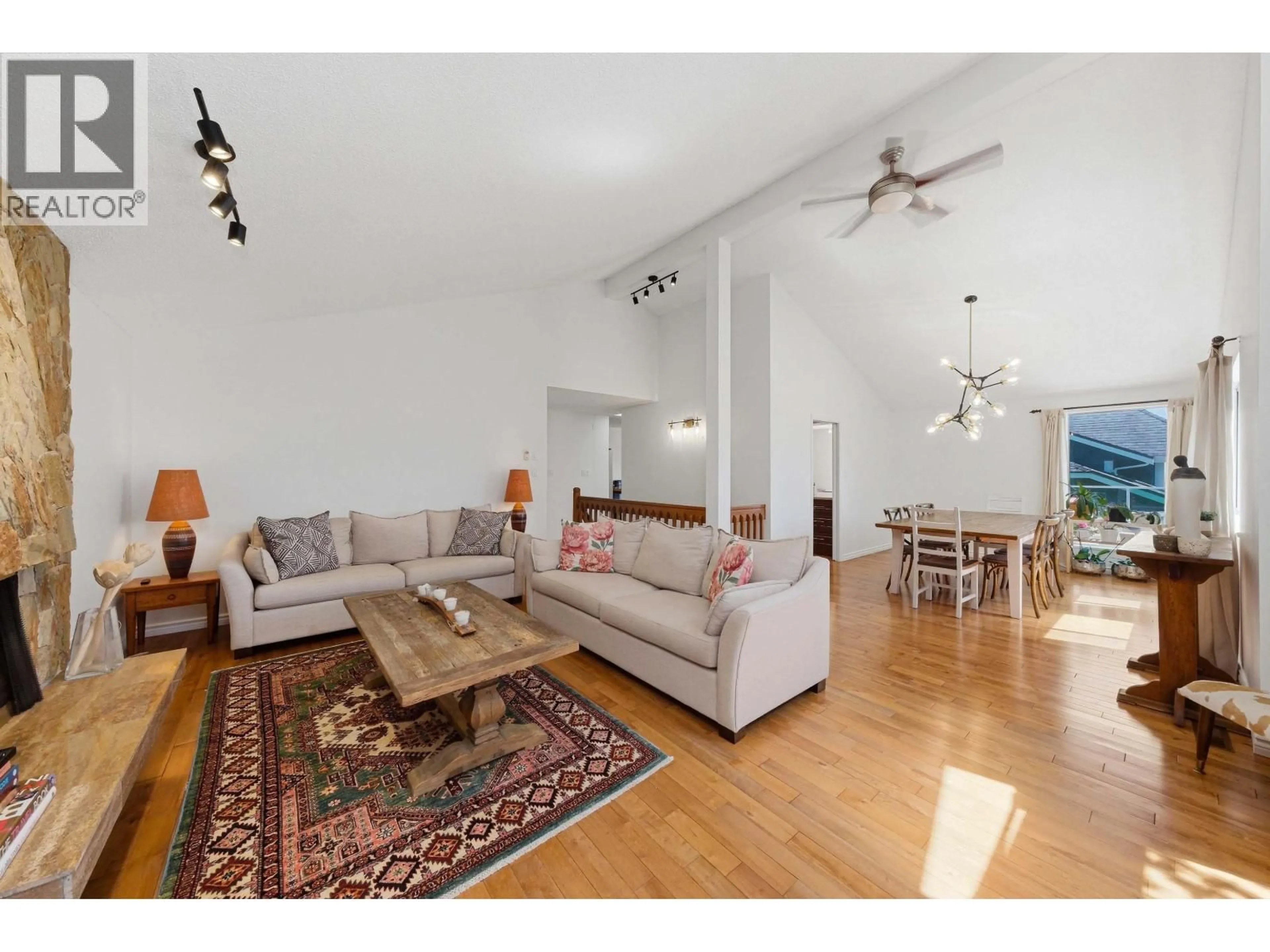 Living room with furniture, wood/laminate floor for 4150 BEST COURT, North Vancouver British Columbia V7G2E3