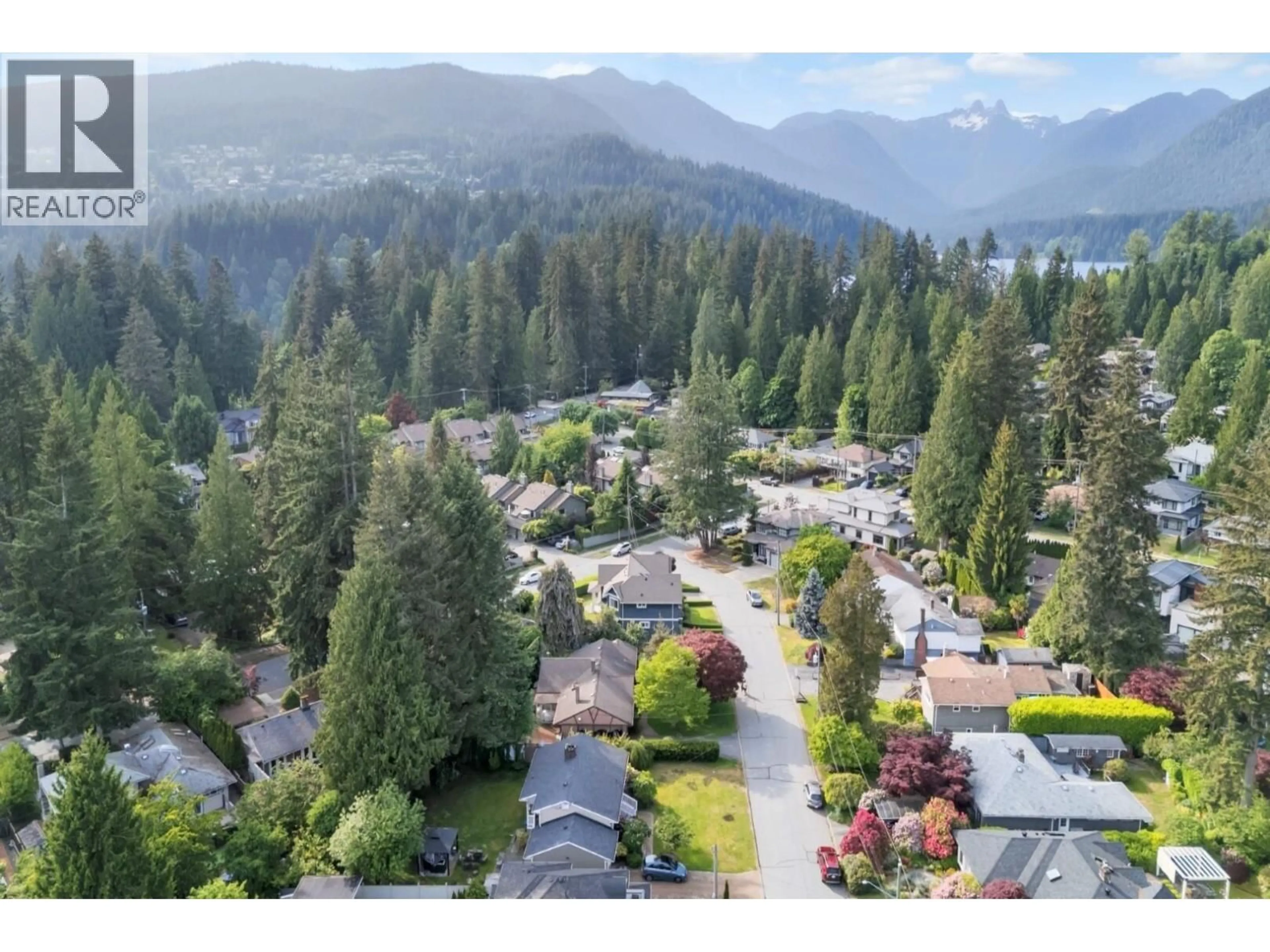 A pic from outside/outdoor area/front of a property/back of a property/a pic from drone, mountain view for 1075 RUTHINA AVENUE, North Vancouver British Columbia V7R2E7