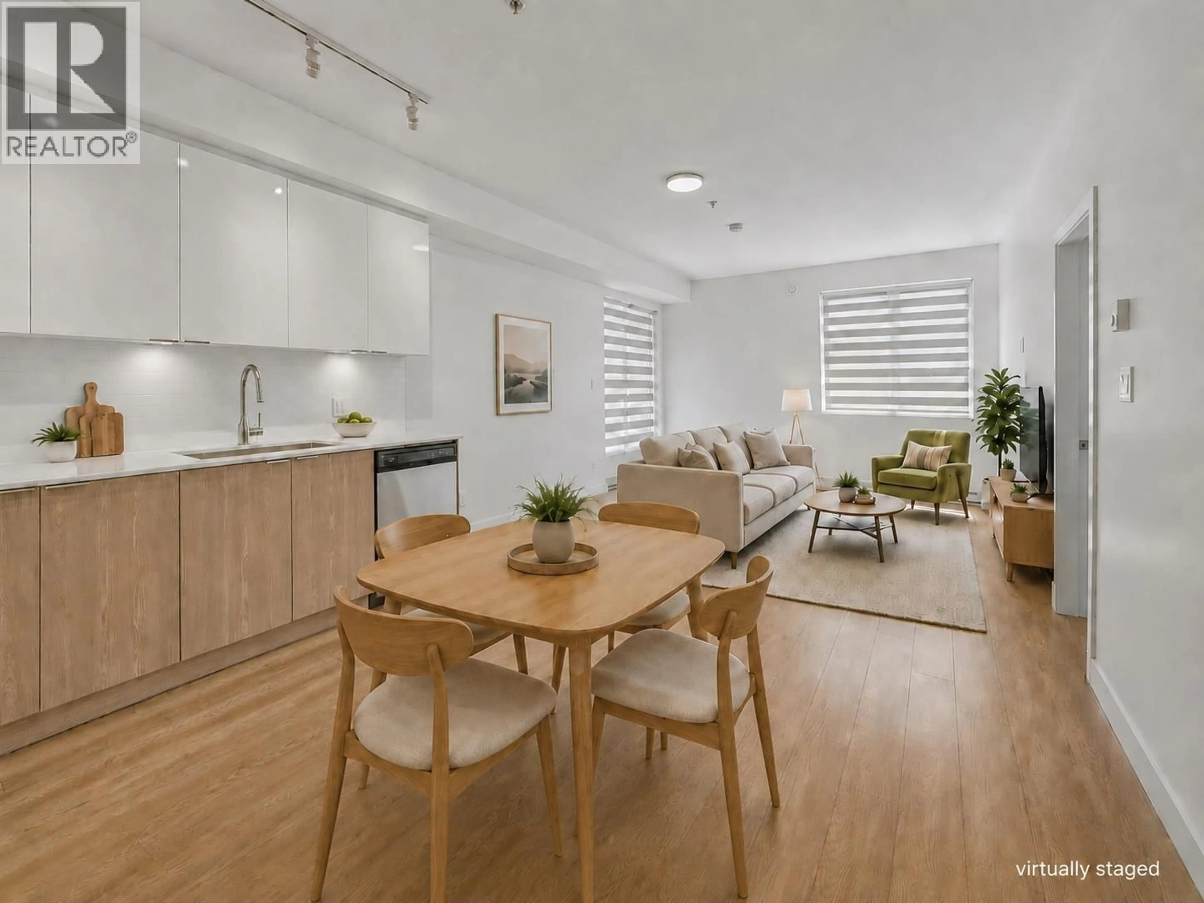 Open concept kitchen, wood/laminate floor for 402 - 37881 CLEVELAND AVENUE, Squamish British Columbia V8B0Z7
