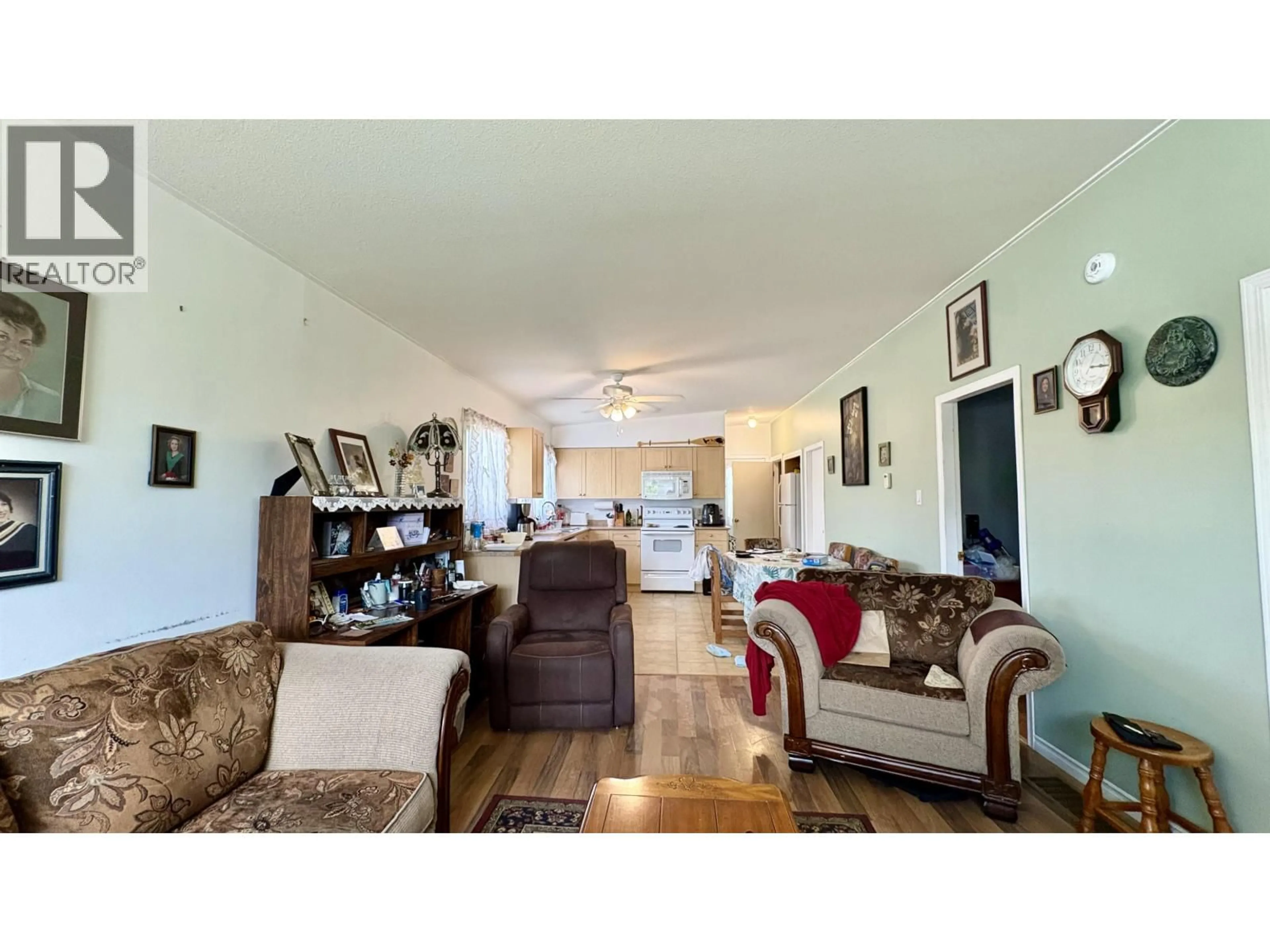 Living room with furniture, wood/laminate floor for 898 EWERT STREET, Prince George British Columbia V2M2N9
