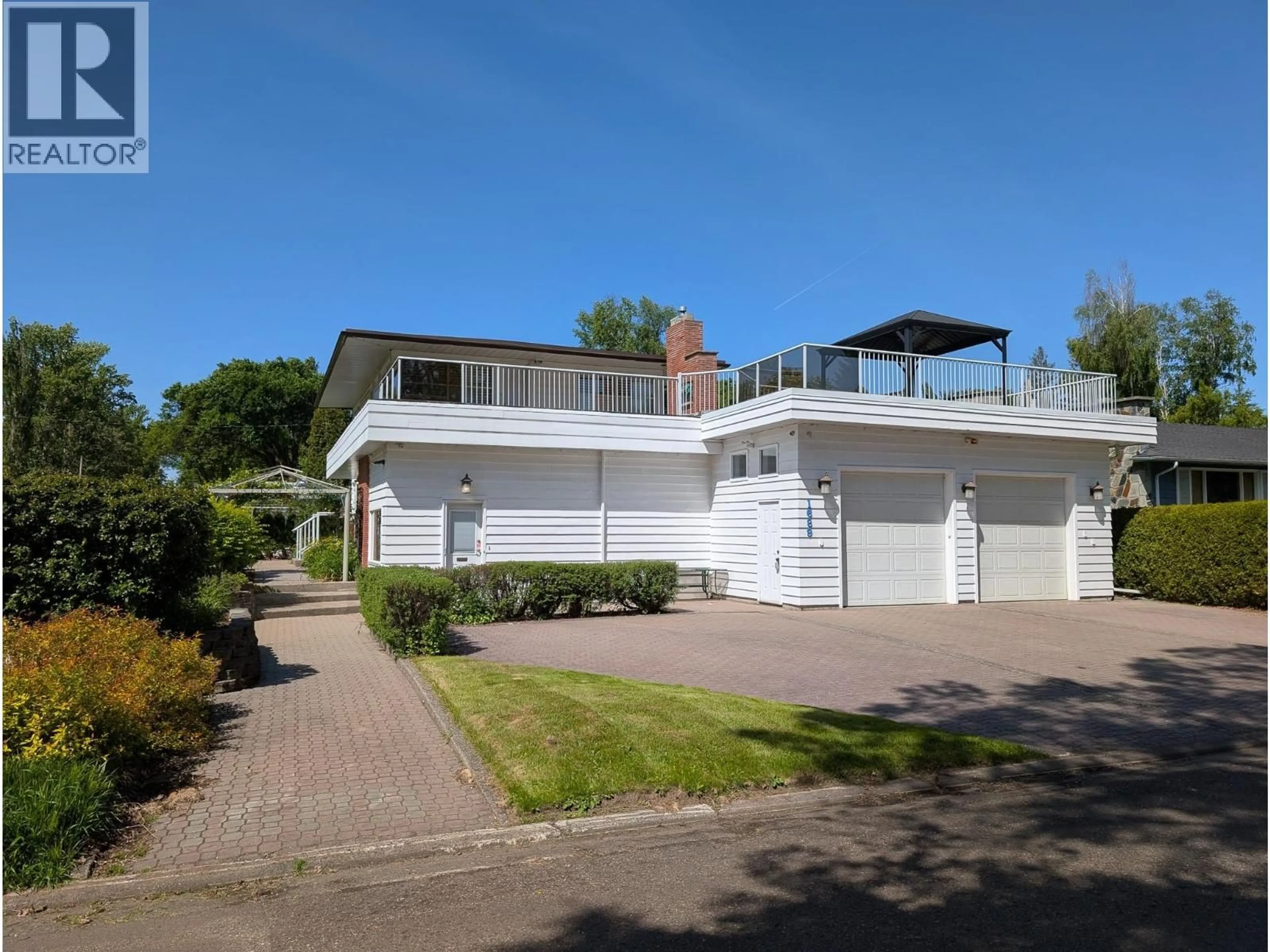 Home with vinyl exterior material, street for 1689 BIRCH STREET, Prince George British Columbia V2L1B3