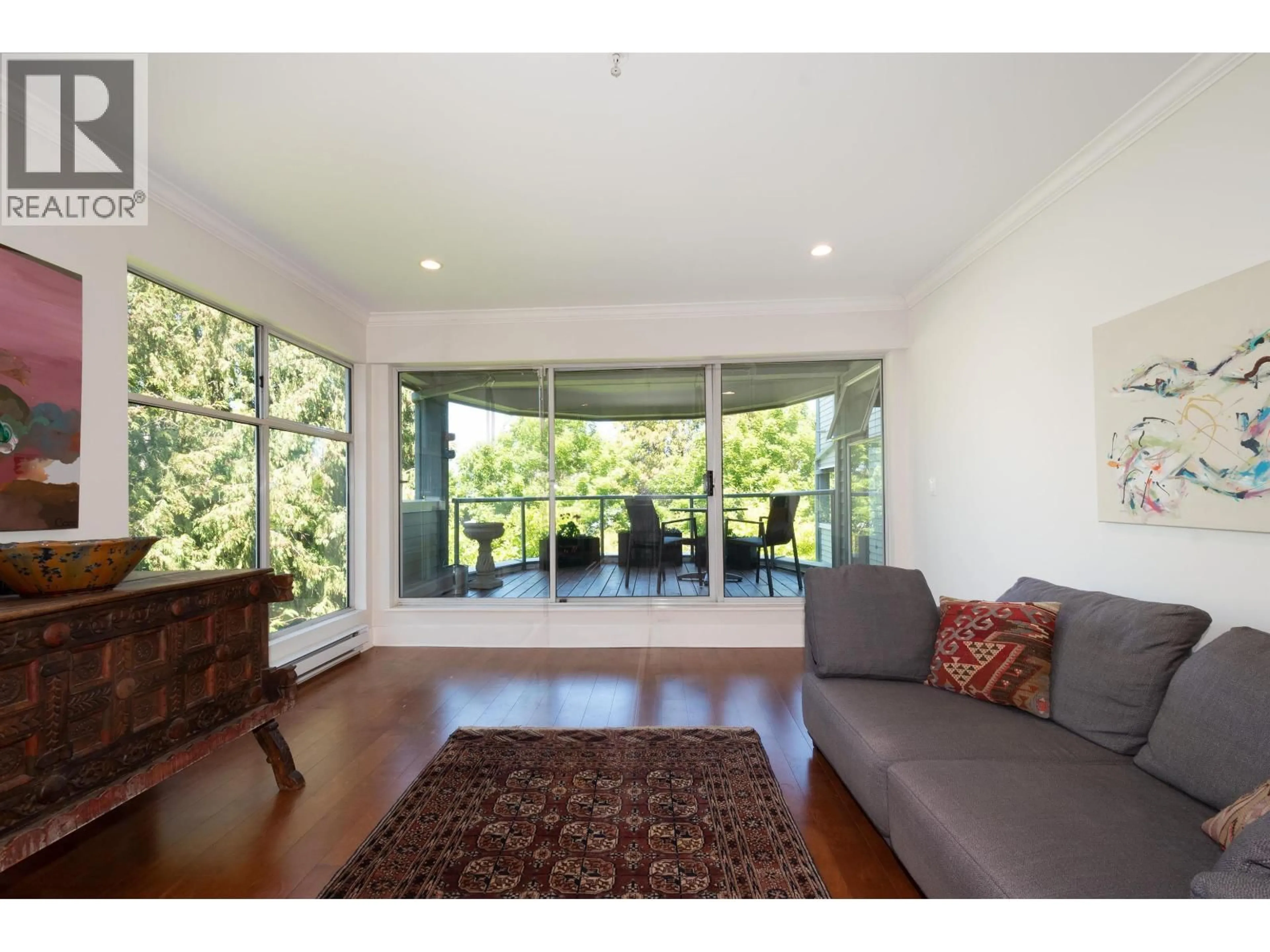 Living room with furniture, wood/laminate floor for 303 - 2250 3RD AVENUE, Vancouver British Columbia V6K1L4