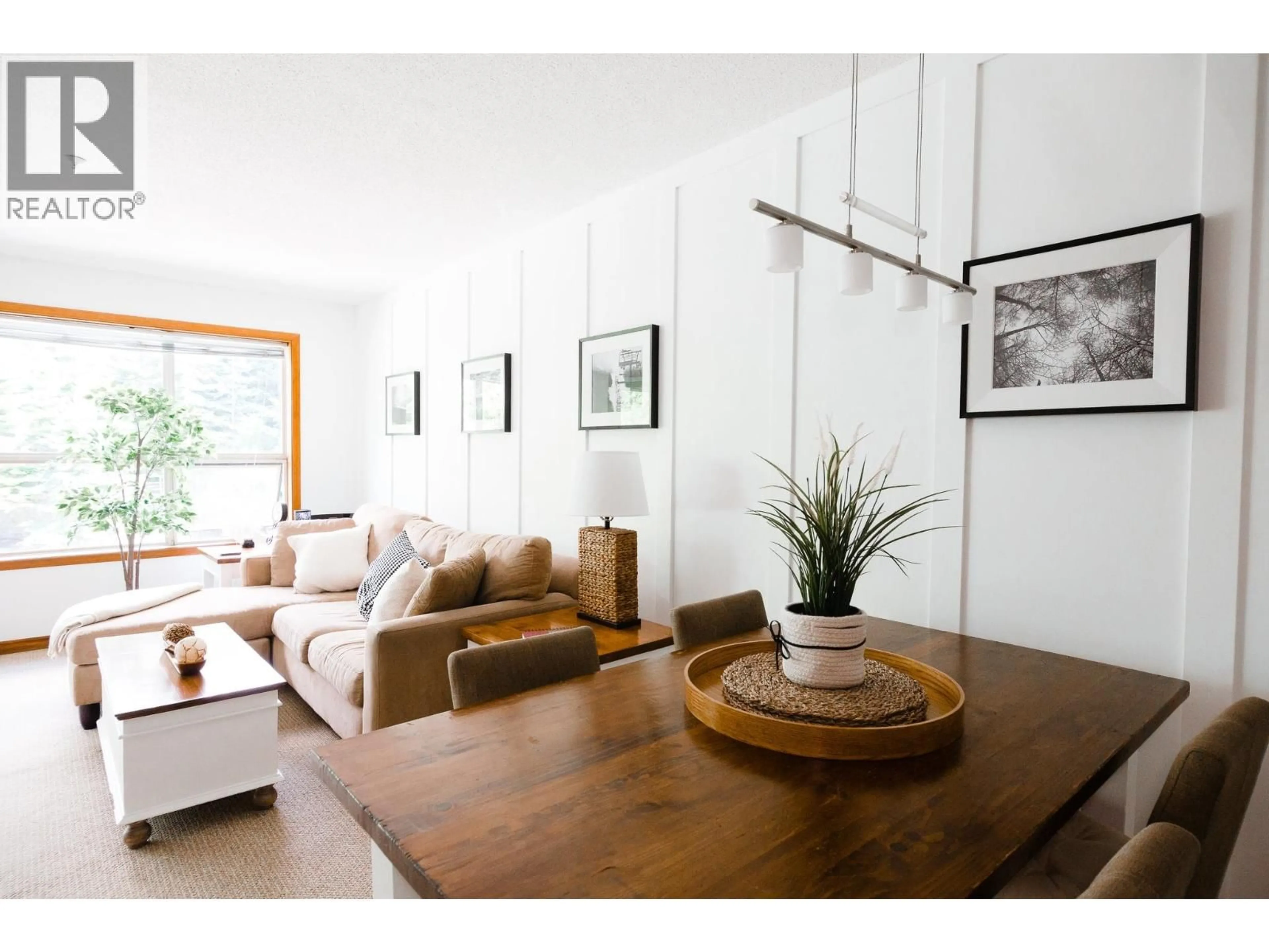 Living room with furniture, wood/laminate floor for 334 - 4800 SPEARHEAD DRIVE, Whistler British Columbia V8E1G1