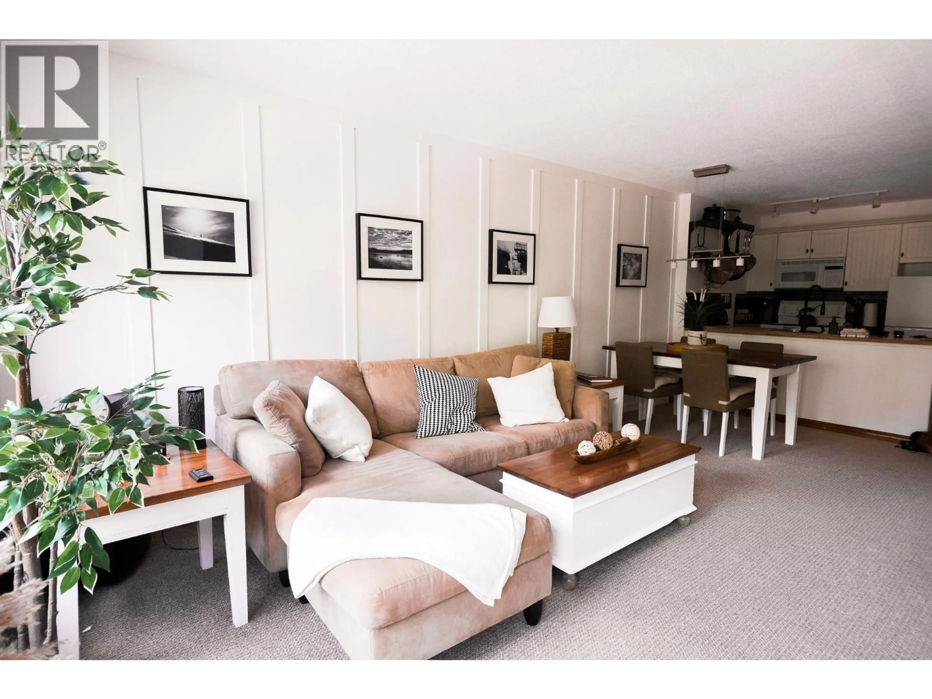 Living room with furniture, wood/laminate floor for 334 - 4800 SPEARHEAD DRIVE, Whistler British Columbia V8E1G1