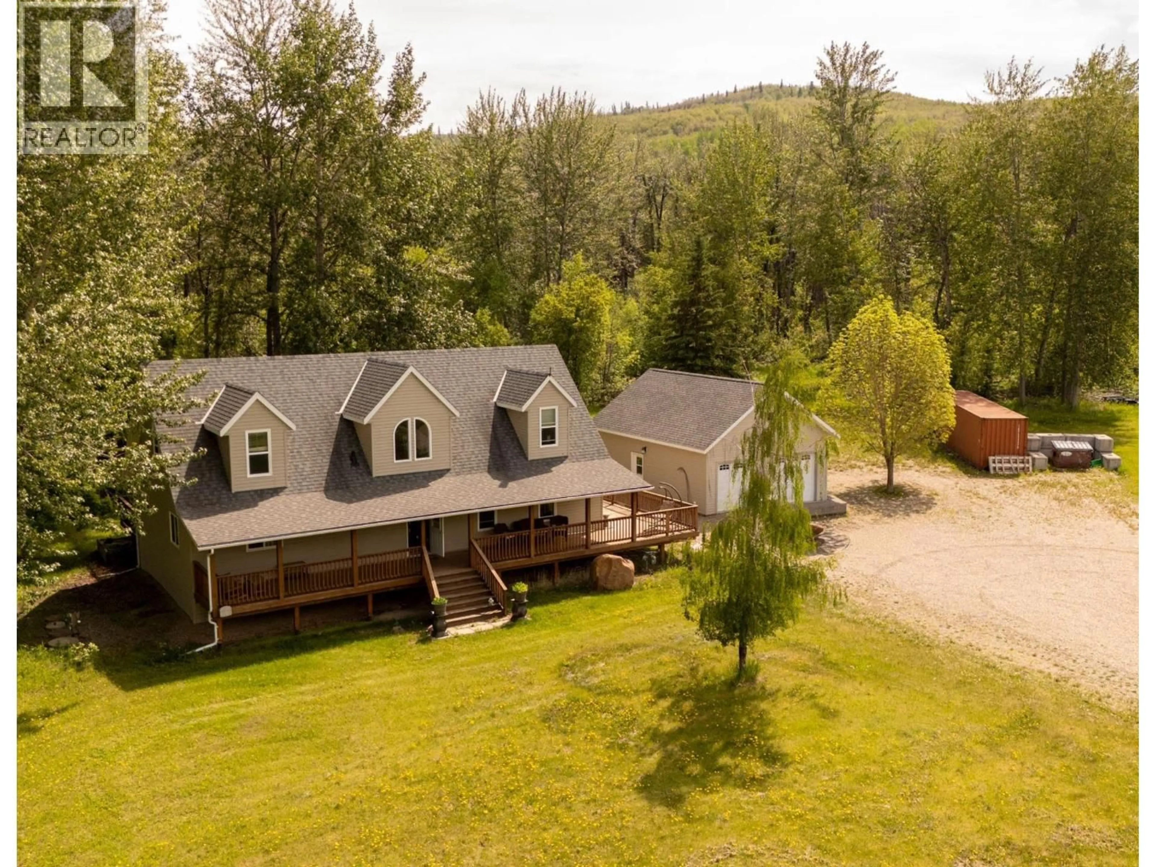 A pic from outside/outdoor area/front of a property/back of a property/a pic from drone, mountain view for 5793 TAYLOR FLATS SUBDIV, Fort St. John British Columbia V0C2K0