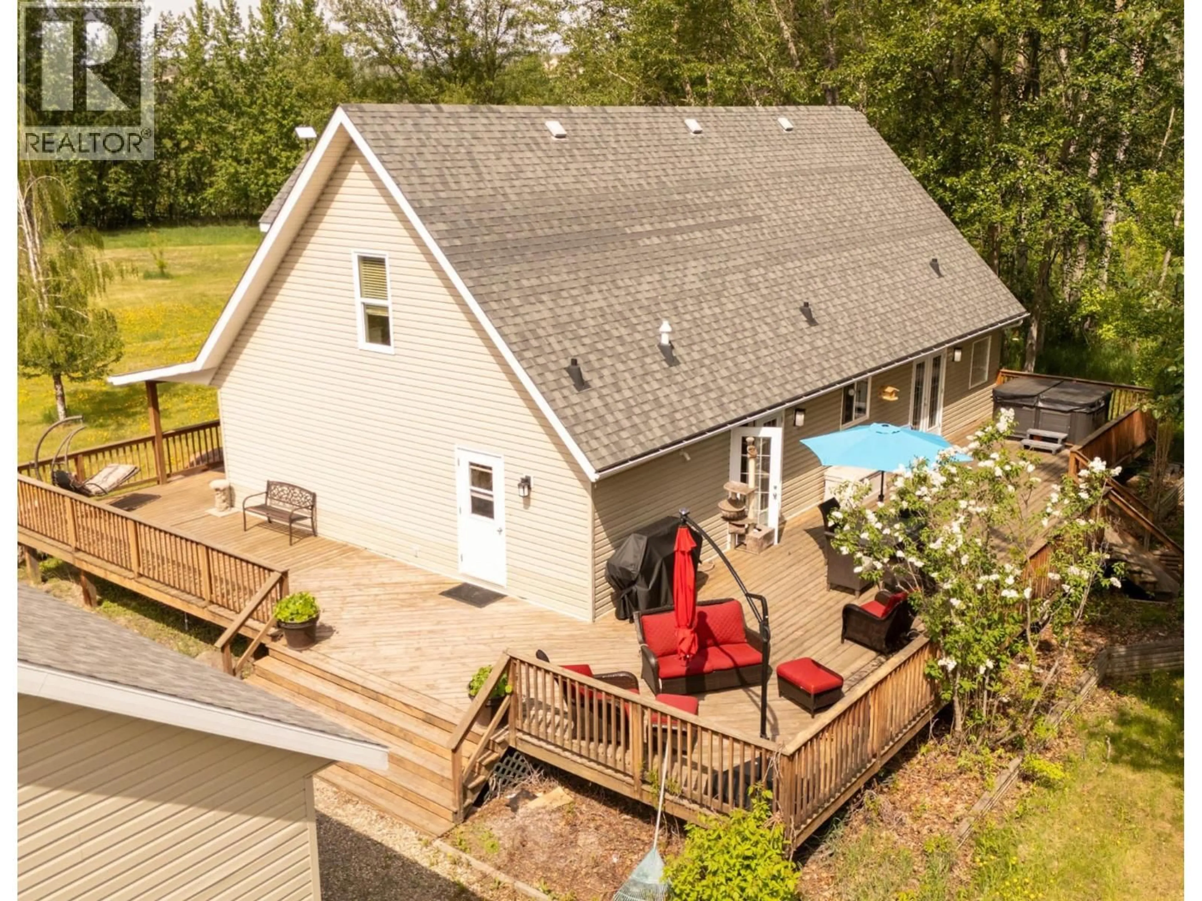 A pic from outside/outdoor area/front of a property/back of a property/a pic from drone, water/lake/river/ocean view for 5793 TAYLOR FLATS SUBDIV, Fort St. John British Columbia V0C2K0