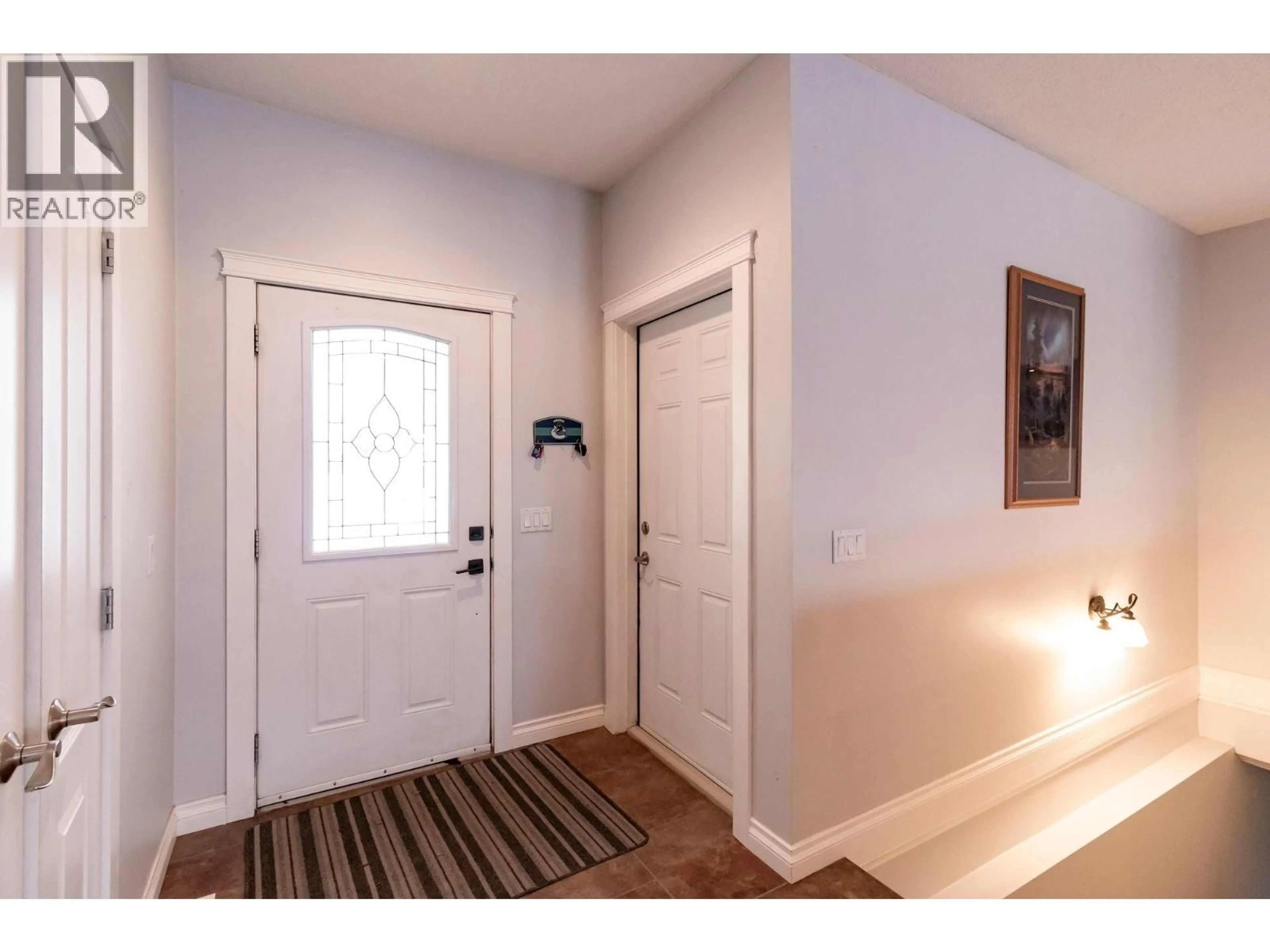 Indoor entryway for 11007 88A STREET, Fort St. John British Columbia V1J7G2
