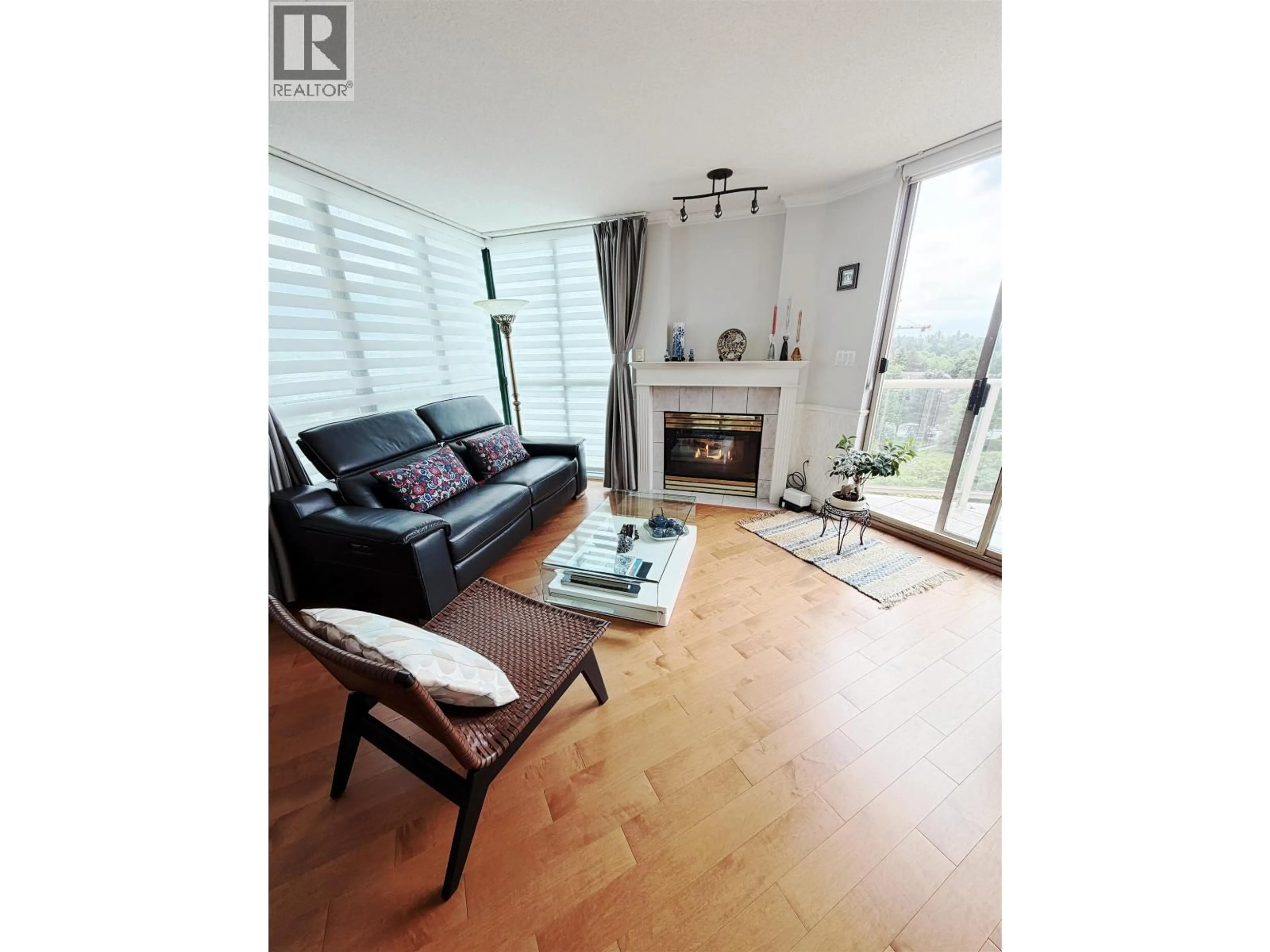 Living room with furniture, wood/laminate floor for 806 - 1199 EASTWOOD STREET, Coquitlam British Columbia V3B7W7