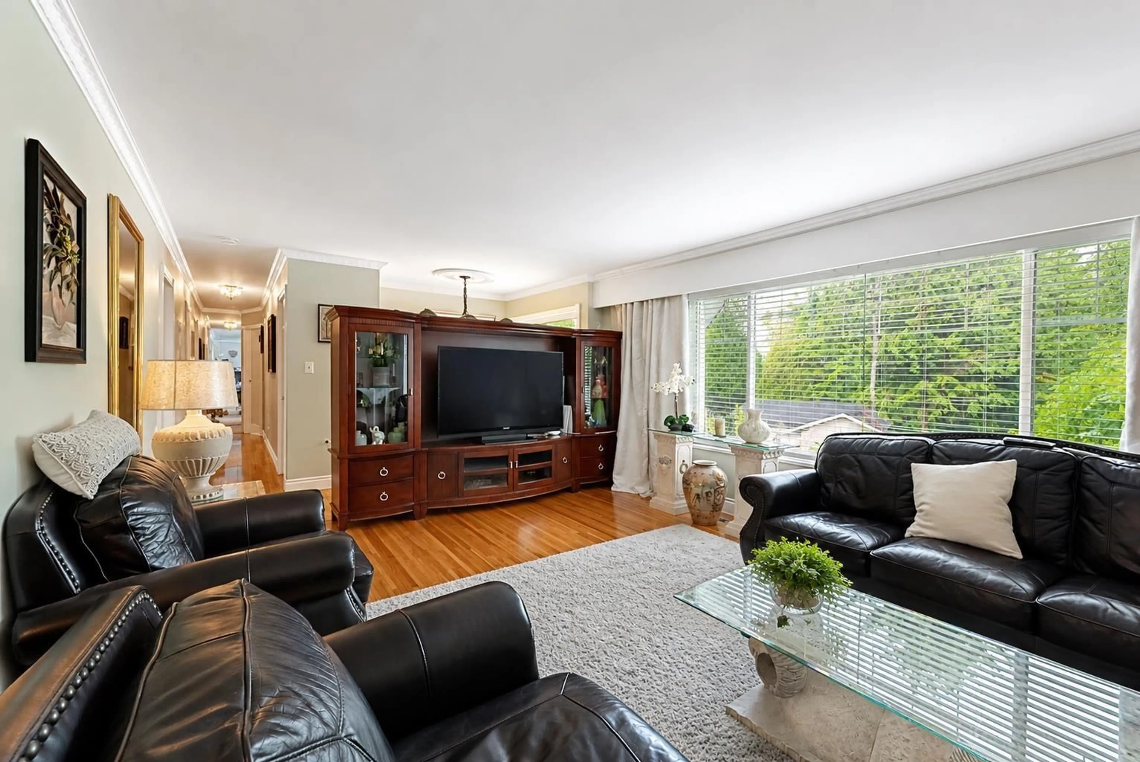 Living room with furniture, wood/laminate floor for 13450 112A AVENUE, Surrey British Columbia V3R2G5