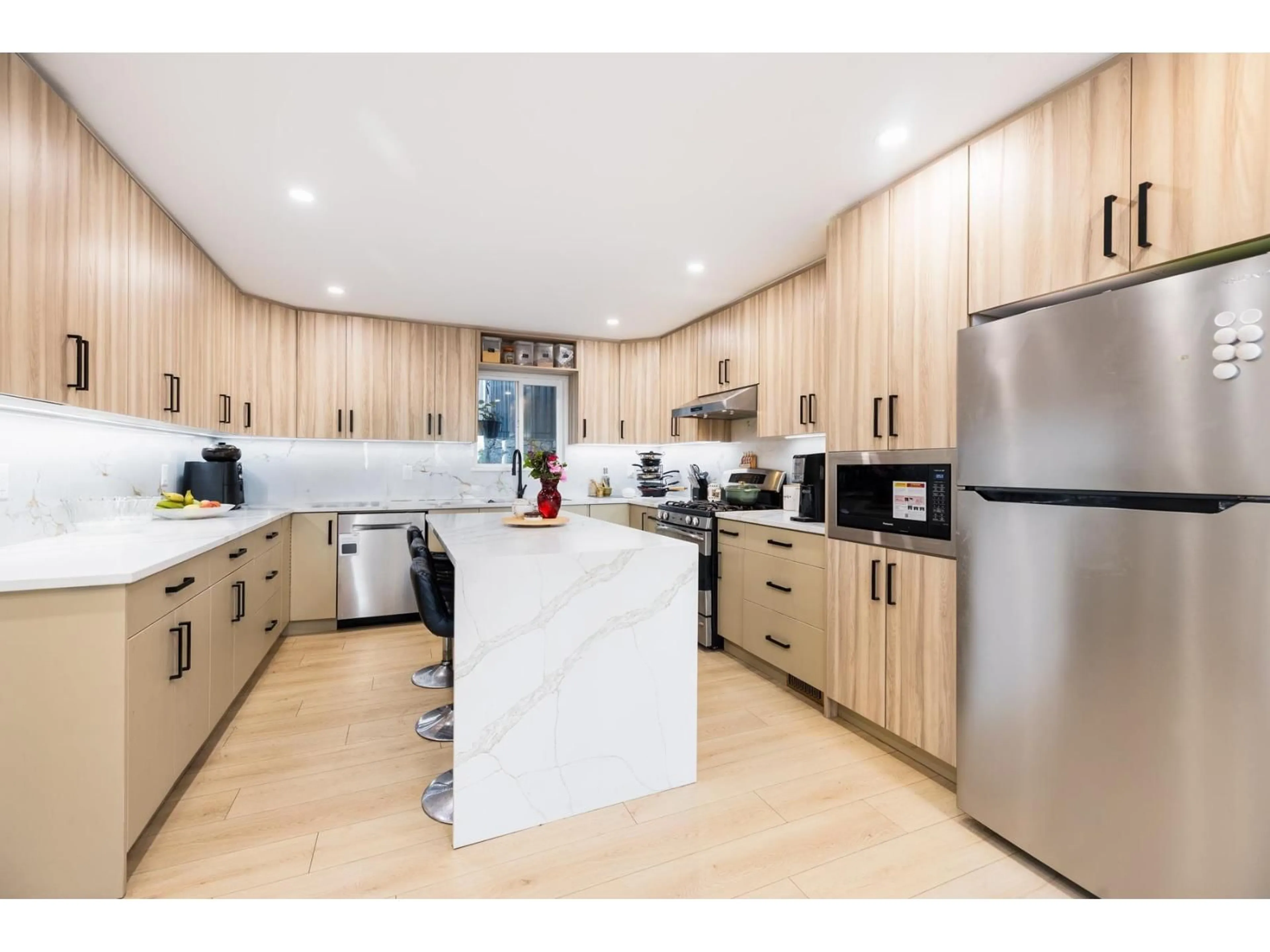 Open concept kitchen, wood/laminate floor for 7437 GARFIELD DRIVE, Delta British Columbia V4C6X9