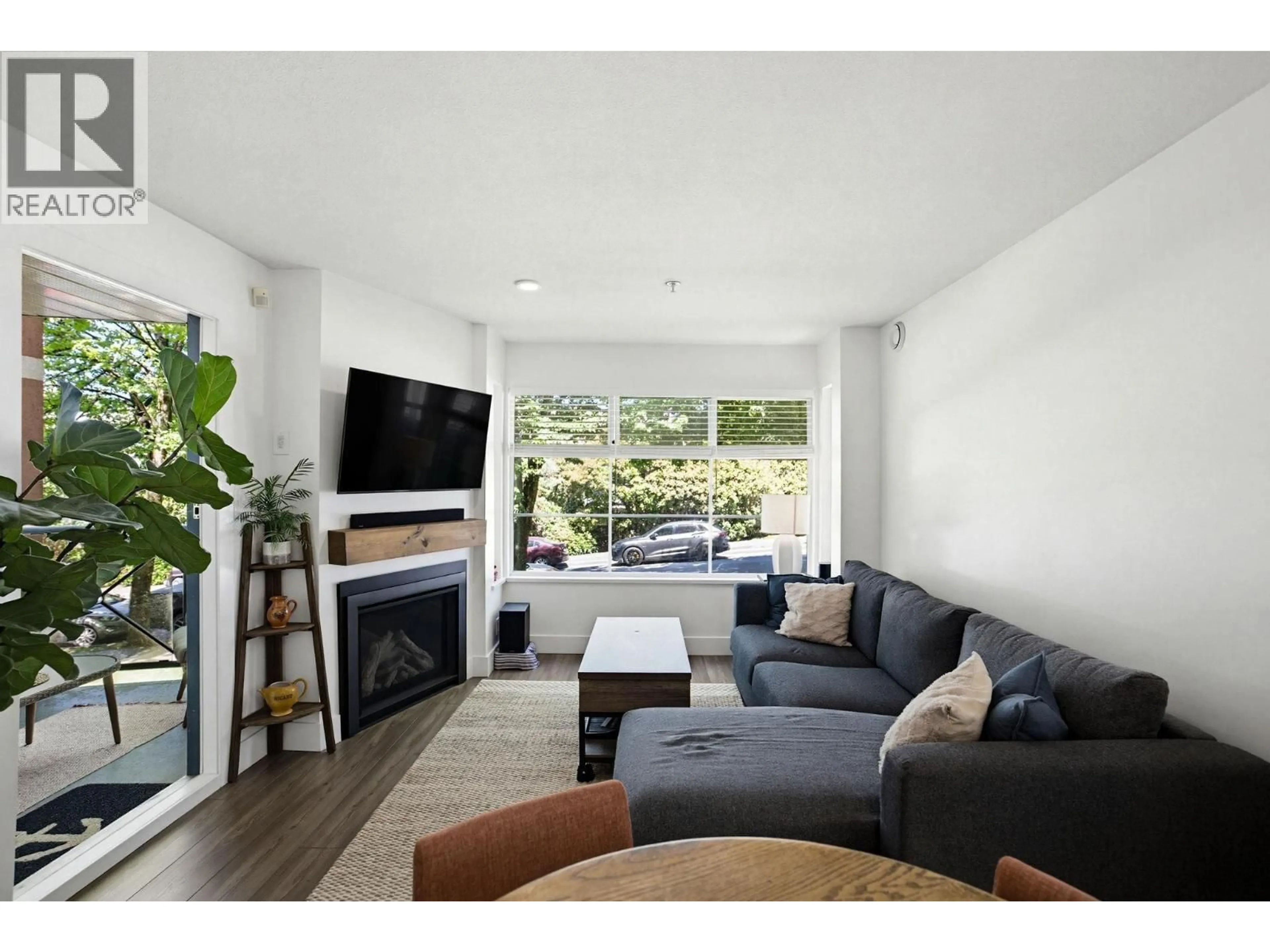 Living room with furniture, unknown for 206 - 2388 TRIUMPH STREET, Vancouver British Columbia V5L1L5