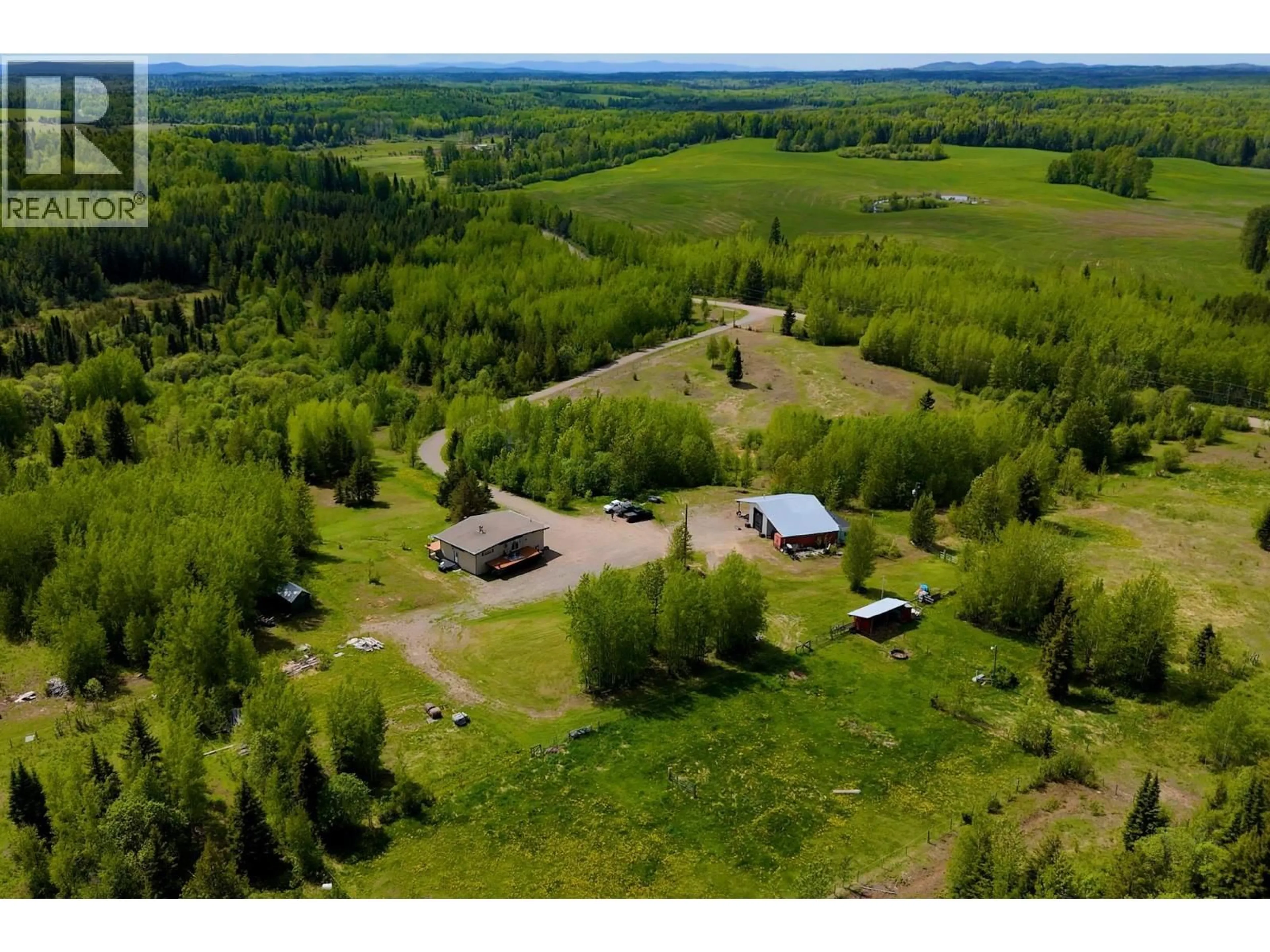 A pic from outside/outdoor area/front of a property/back of a property/a pic from drone, forest/trees view for 34380 CHIEF LAKE ROAD, Prince George British Columbia V2K5L6