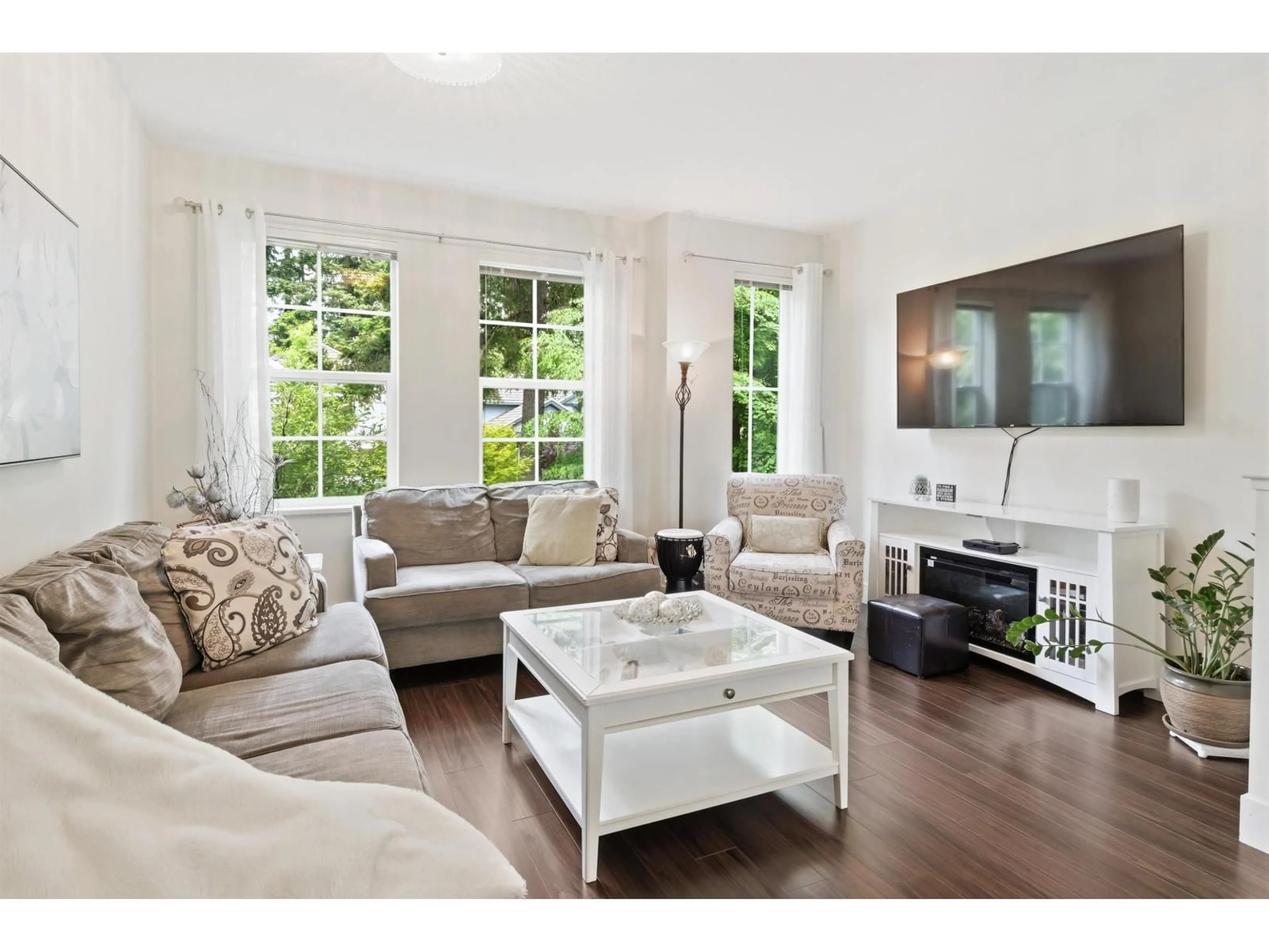 Living room with furniture, wood/laminate floor for 20 - 3399 151 STREET, Surrey British Columbia V3Z0L3