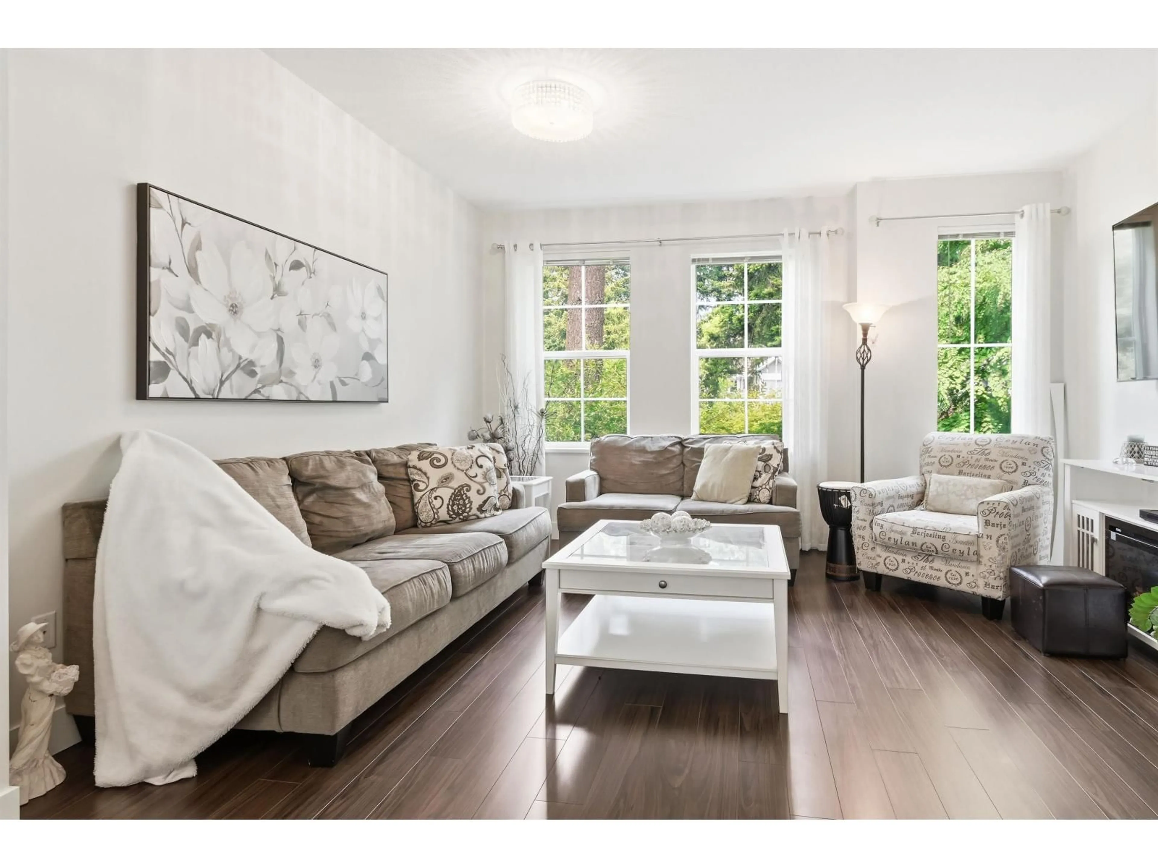 Living room with furniture, wood/laminate floor for 20 - 3399 151 STREET, Surrey British Columbia V3Z0L3