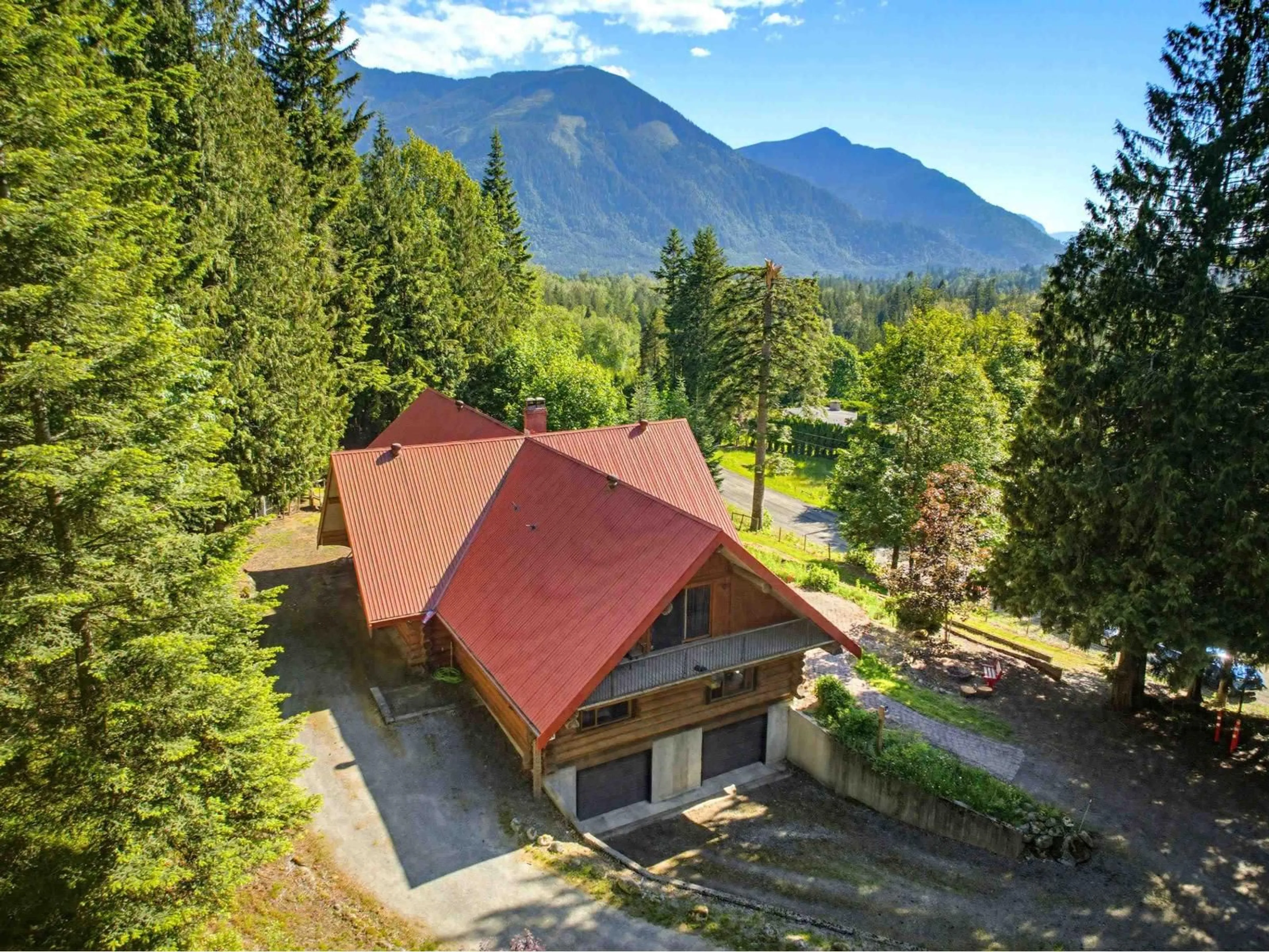A pic from outside/outdoor area/front of a property/back of a property/a pic from drone, mountain view for 5520 GRAHAM DRIVE, Ryder Lake British Columbia V4Z1G6