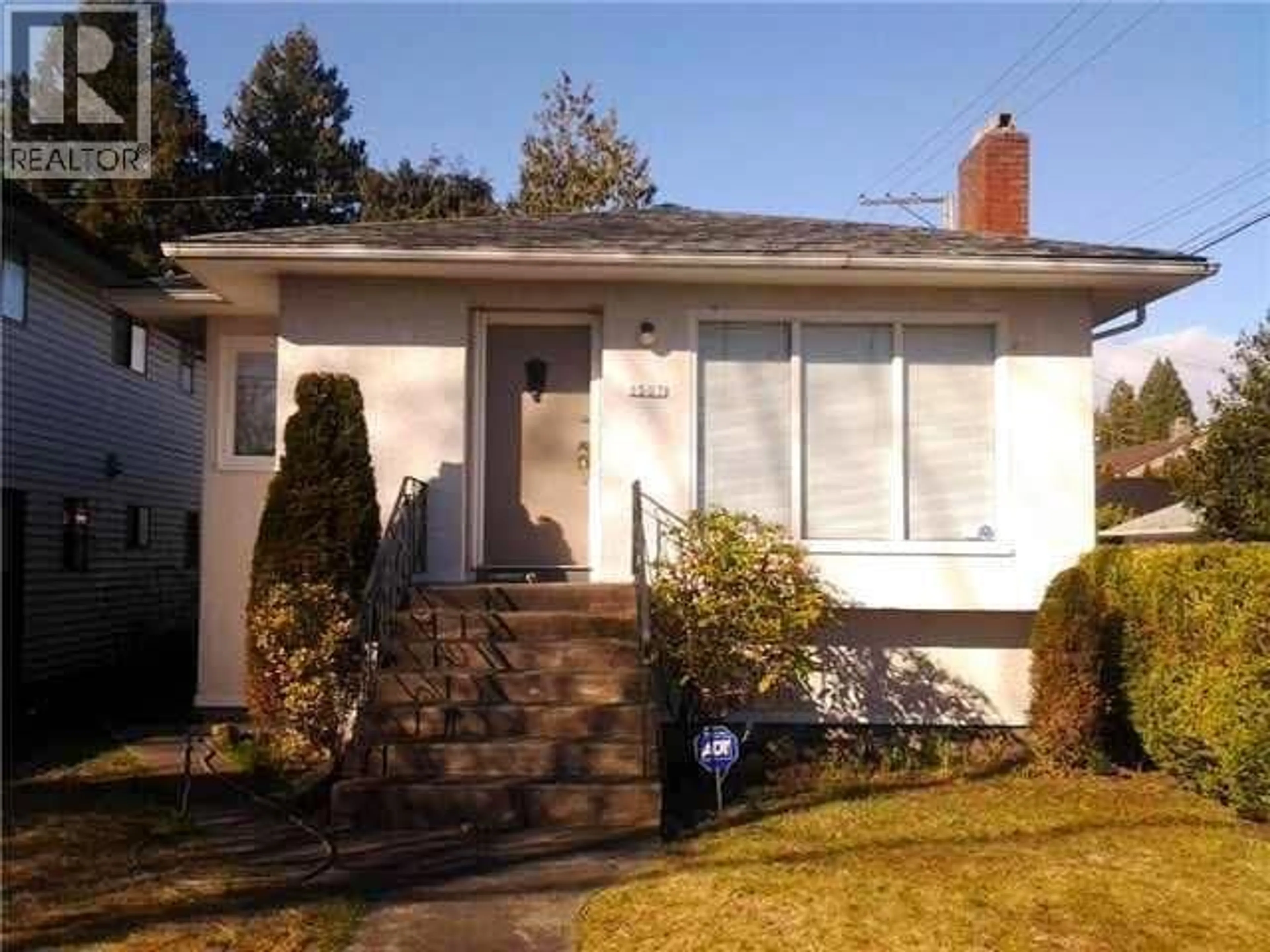 Home with vinyl exterior material, street for 1507 63RD AVENUE, Vancouver British Columbia V6P2H5