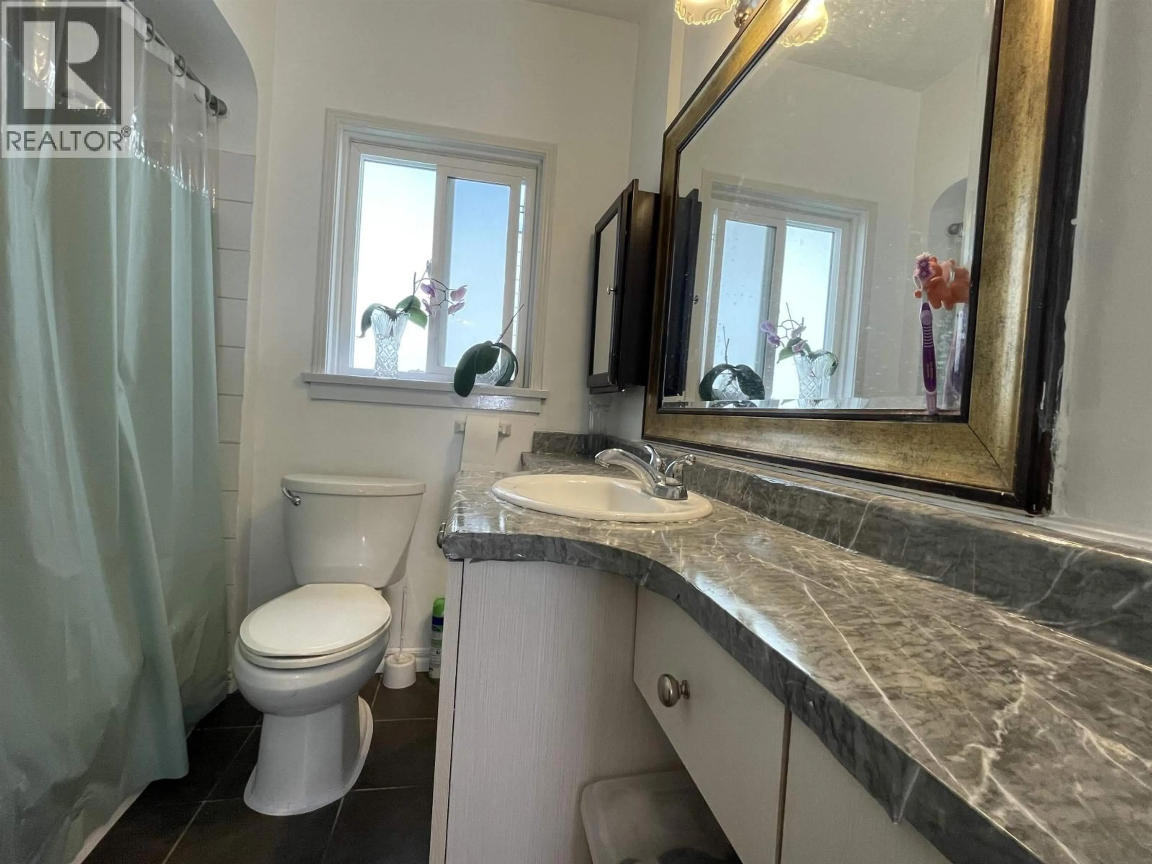 Standard bathroom, ceramic/tile floor for 1507 63RD AVENUE, Vancouver British Columbia V6P2H5
