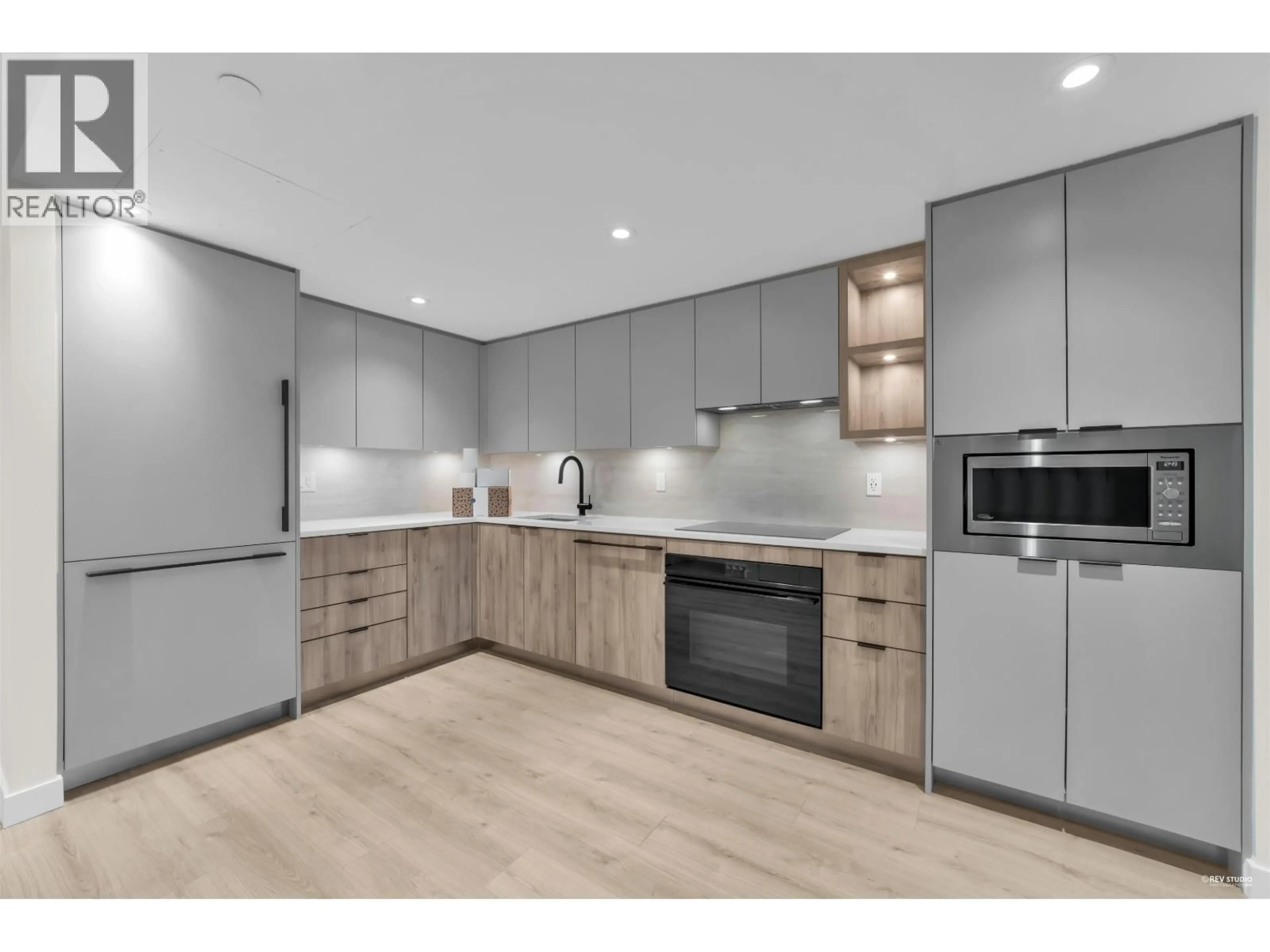 Open concept kitchen, unknown for 401 - 755 HARBOURSIDE DRIVE, North Vancouver British Columbia V7P0G1