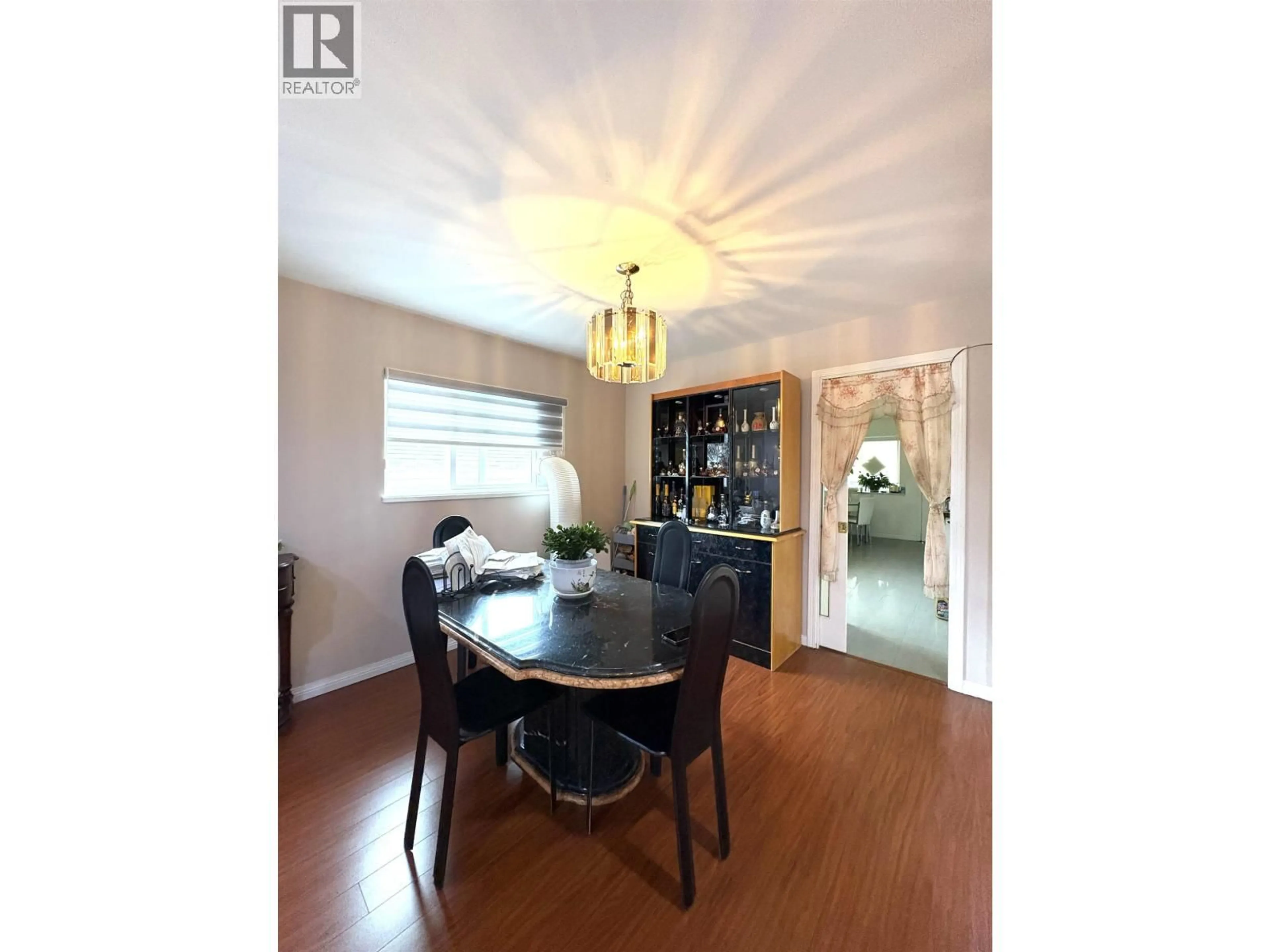 Dining room, wood/laminate floor for 4156 CAMBRIDGE STREET, Burnaby British Columbia V5C1G9