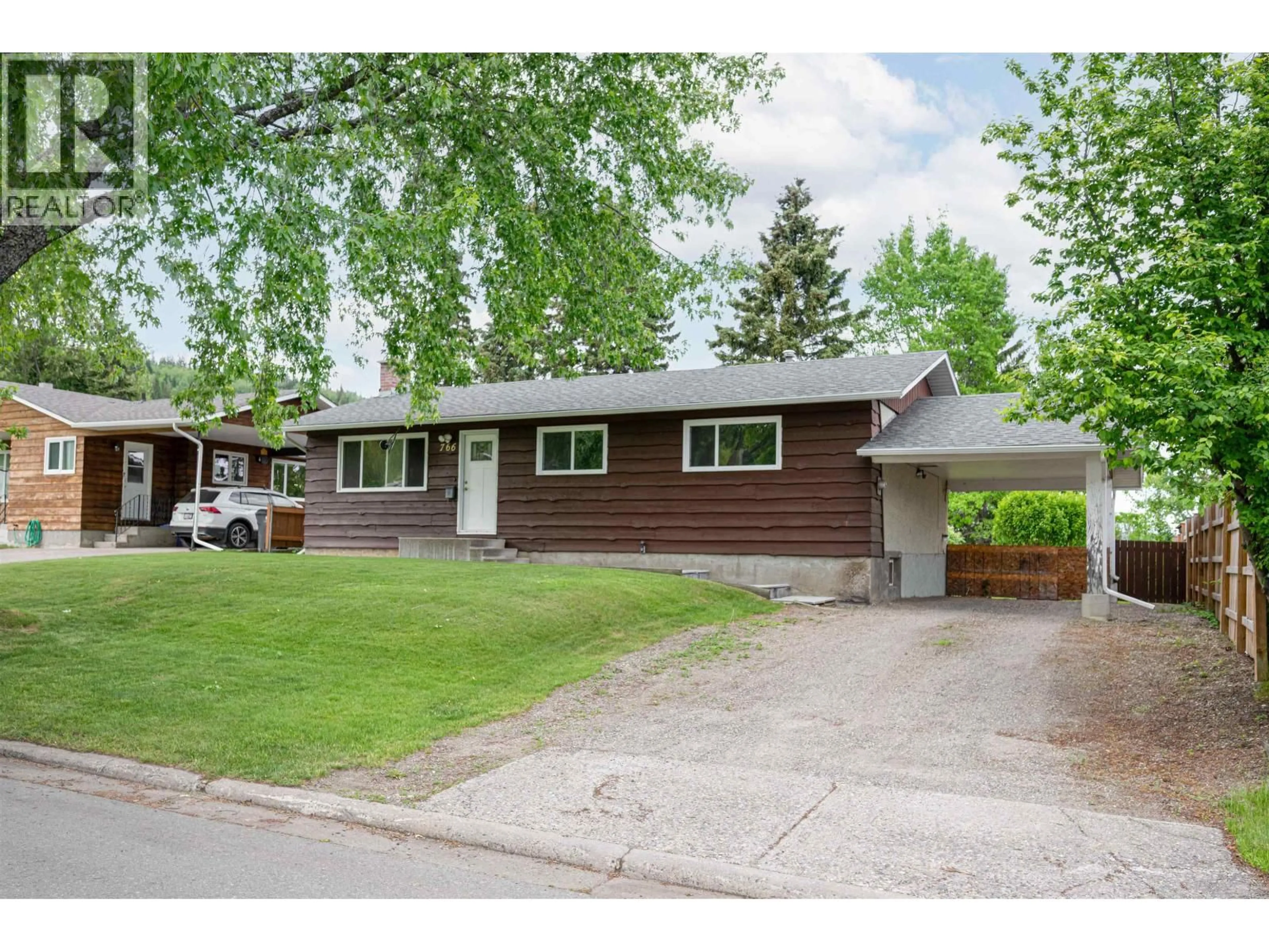 Home with vinyl exterior material, street for 766 OCHAKWIN CRESCENT, Prince George British Columbia V2M5P3