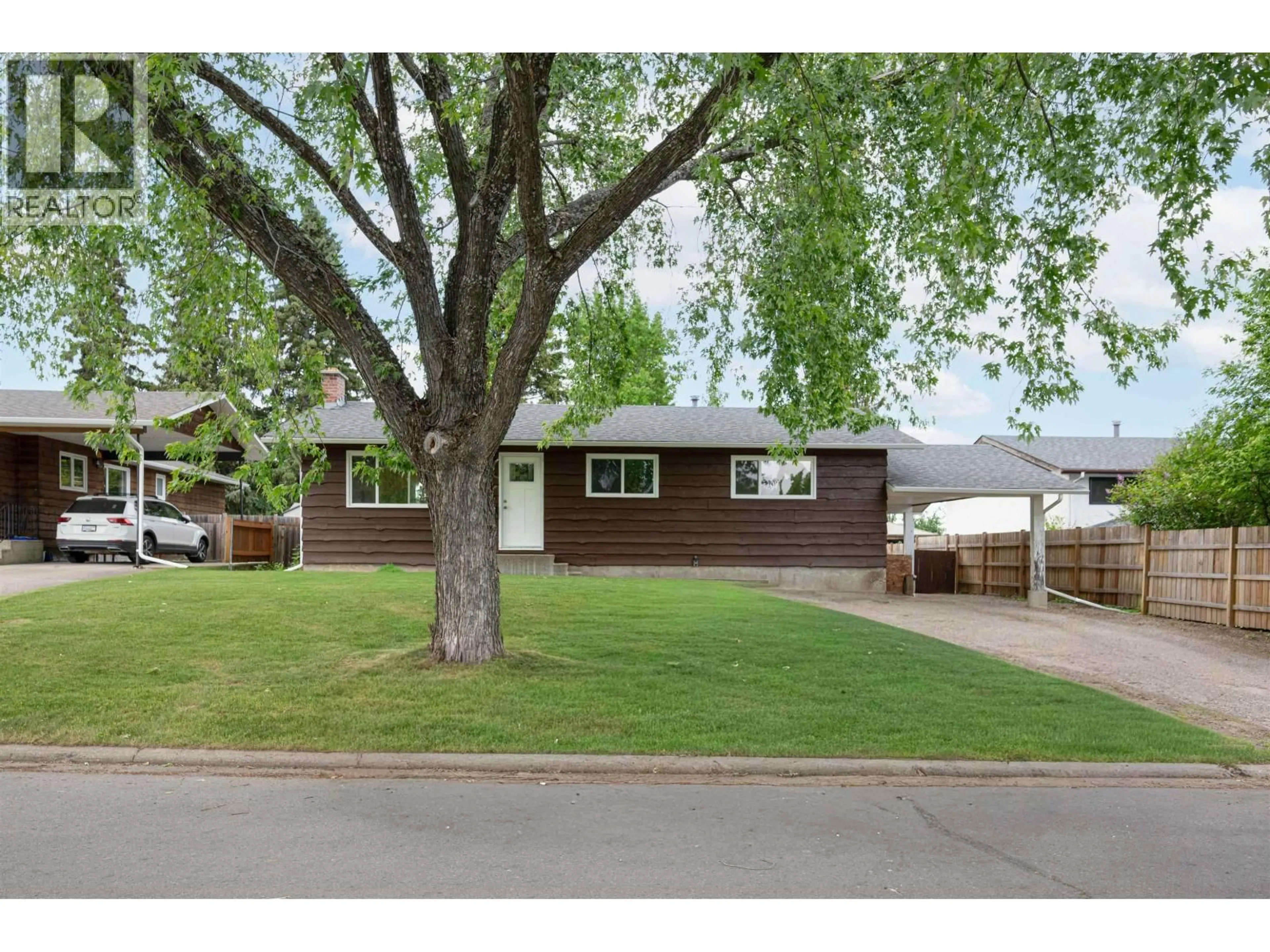 Home with vinyl exterior material, street for 766 OCHAKWIN CRESCENT, Prince George British Columbia V2M5P3