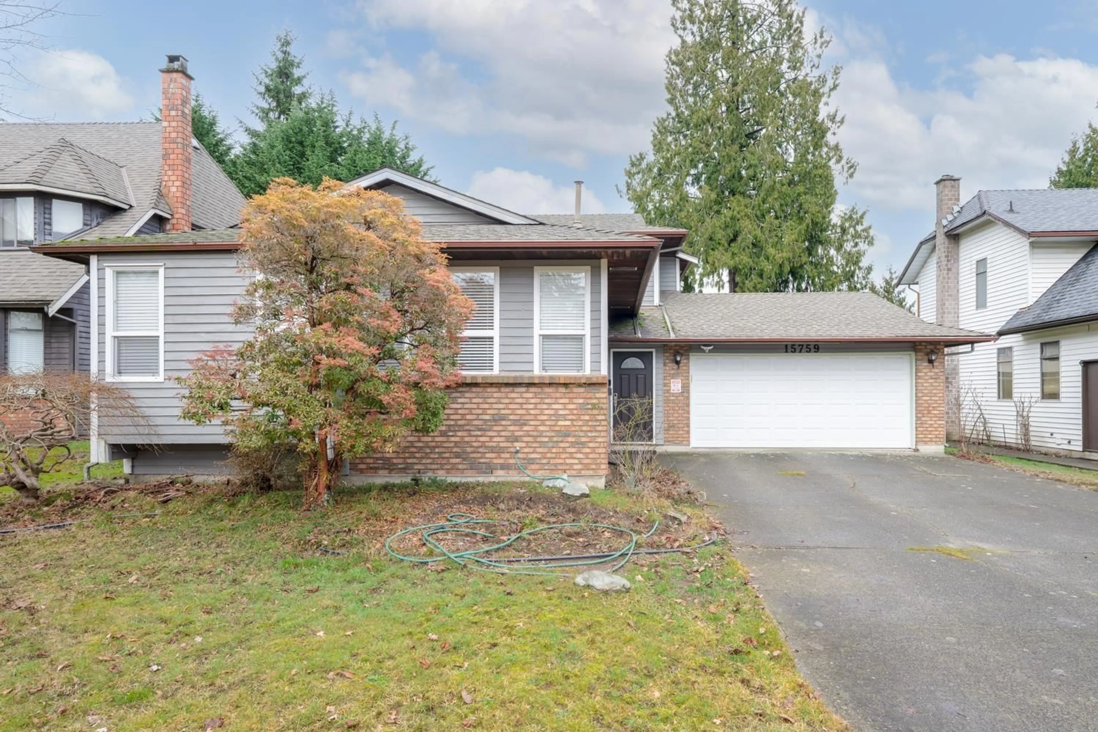 Home with vinyl exterior material, street for 15759 101 AVENUE, Surrey British Columbia V4N2S5