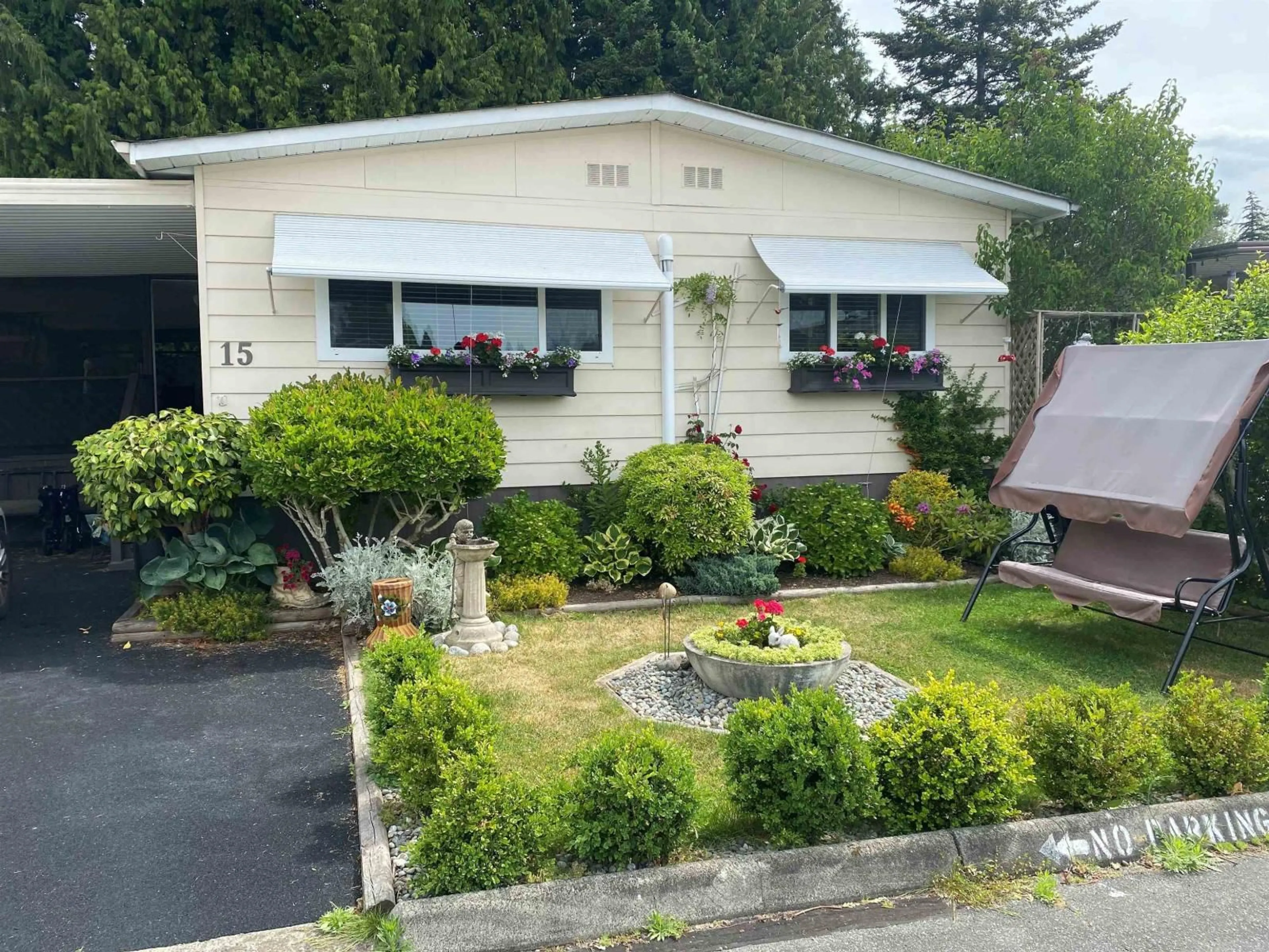Home with vinyl exterior material, street for 15 - 1640 162 STREET, Surrey British Columbia V4A6Y9