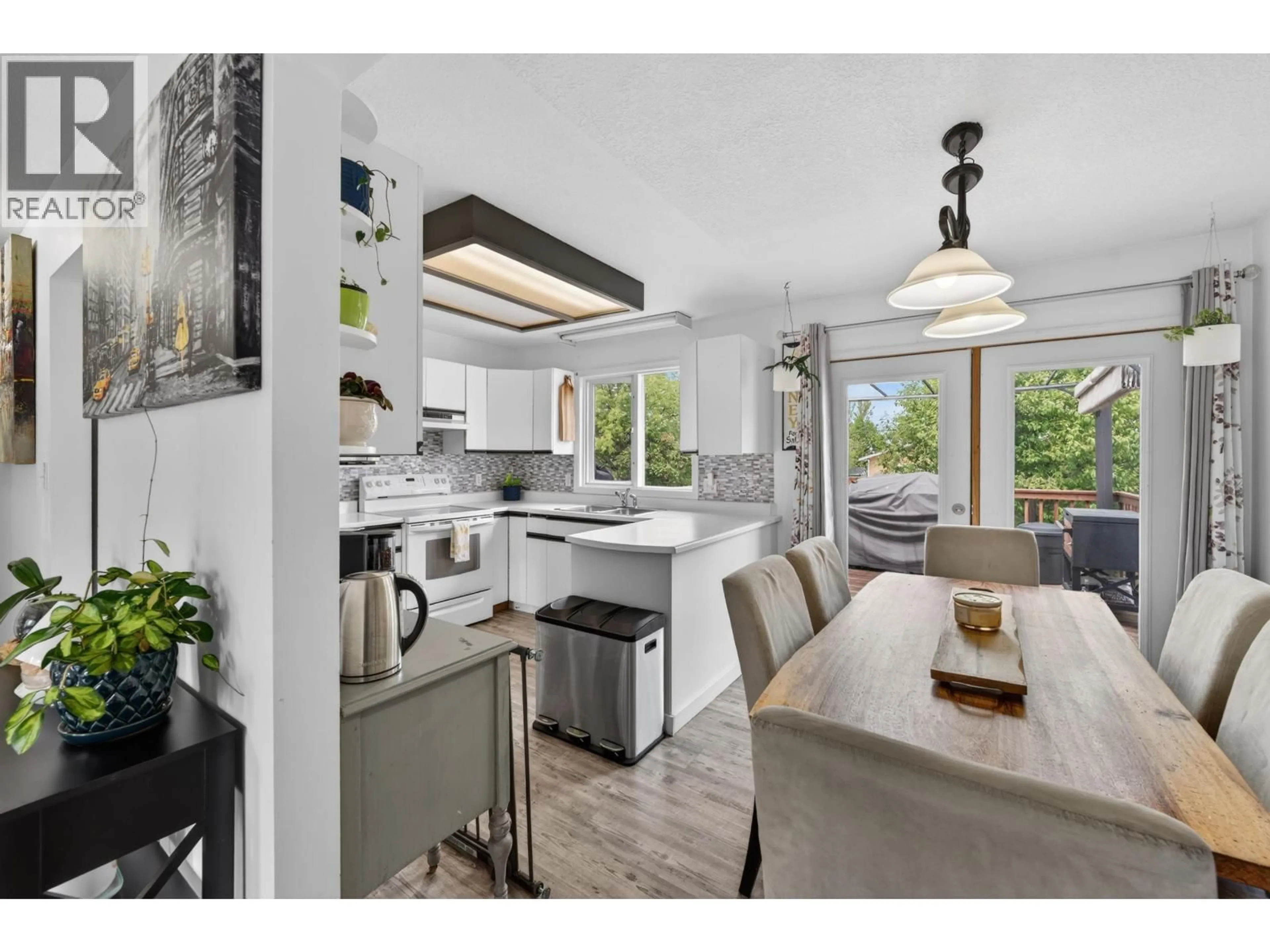 Open concept kitchen, unknown for 8208 98 AVENUE, Fort St. John British Columbia V1J1P5