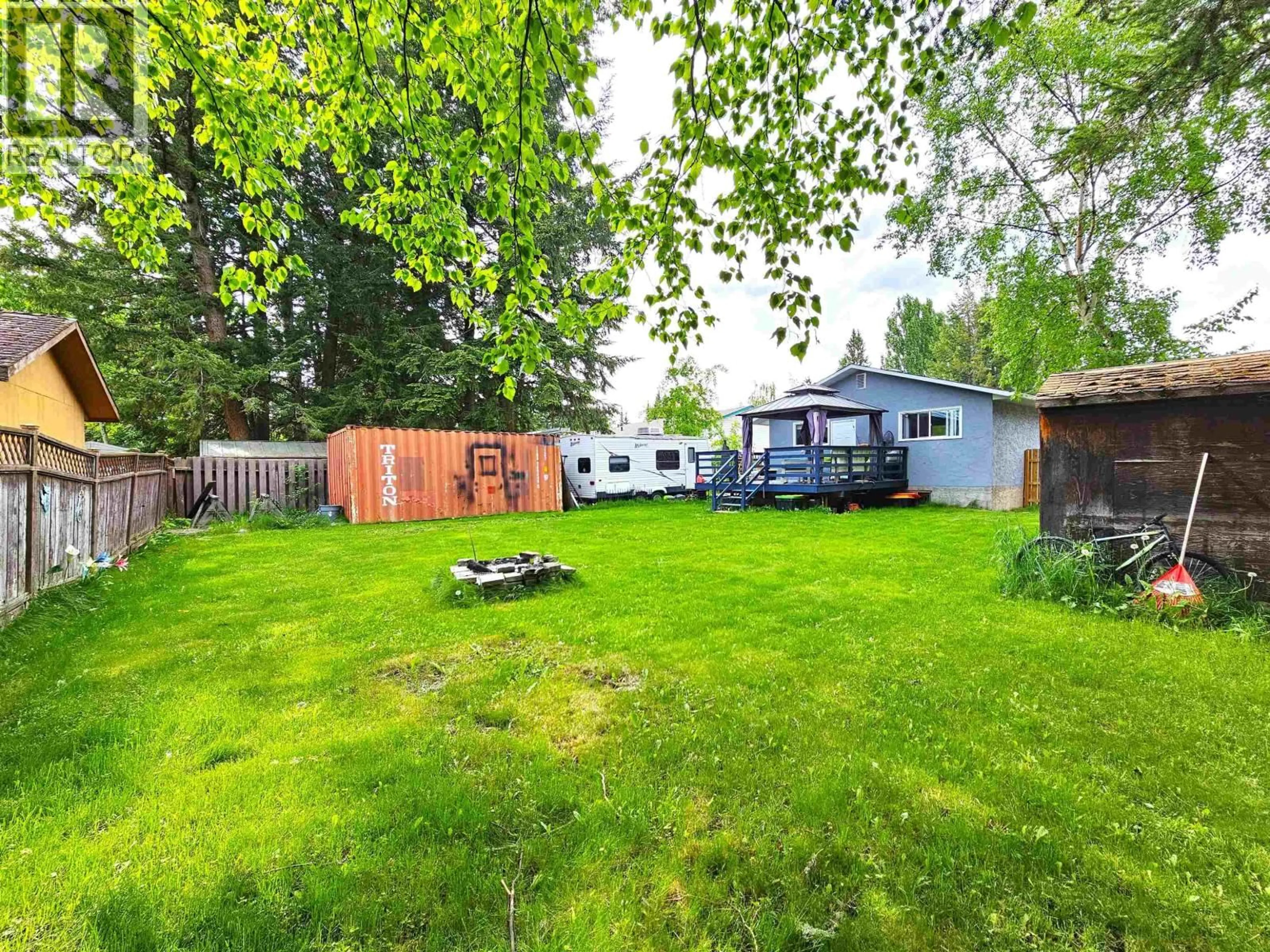 A pic from outside/outdoor area/front of a property/back of a property/a pic from drone, forest/trees view for 7788 NEWTON CRESCENT, Prince George British Columbia V2N3L6