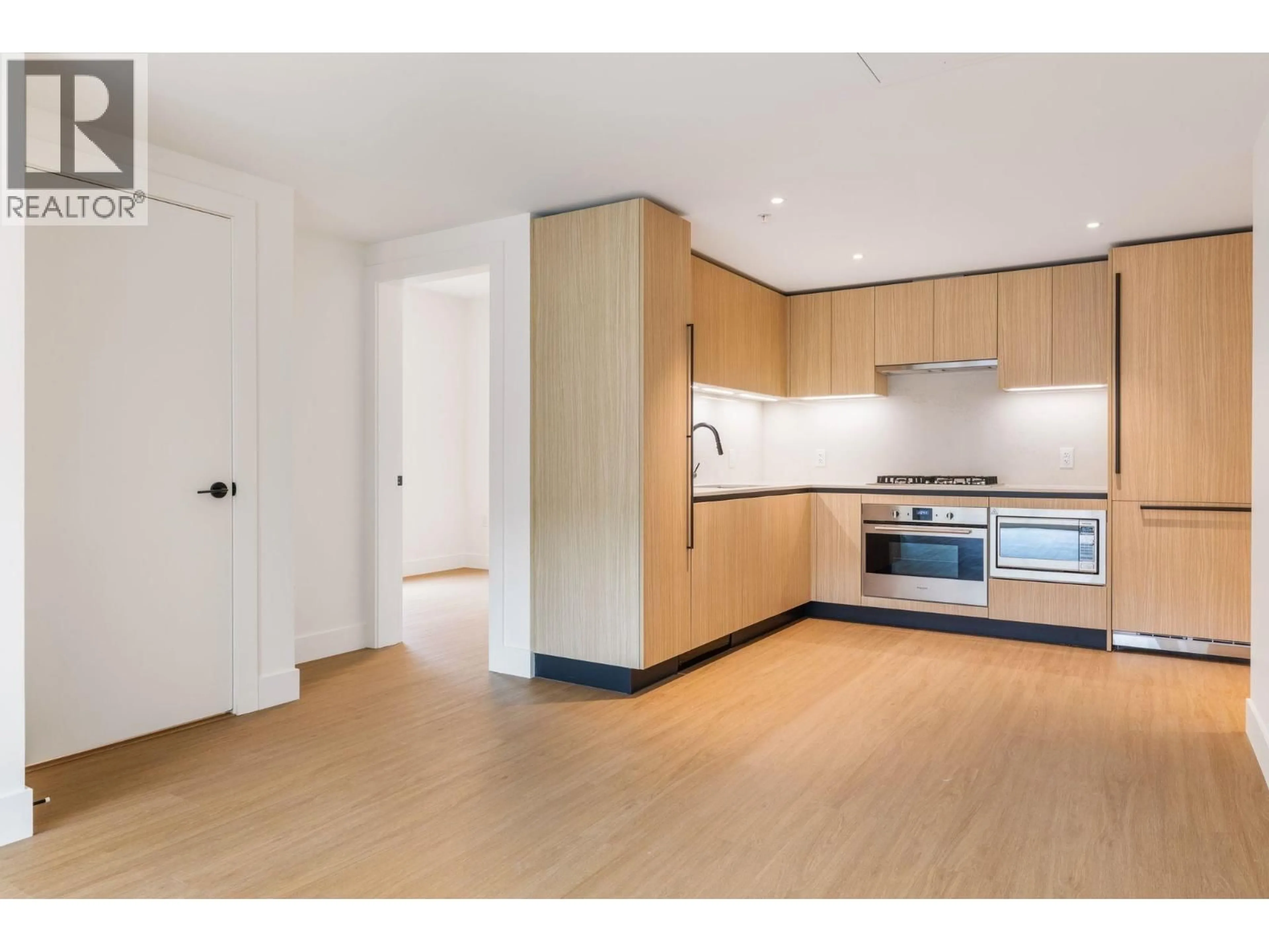 Standard kitchen, wood/laminate floor for 202 - 2235 BROADWAY, Vancouver British Columbia V5N0J5