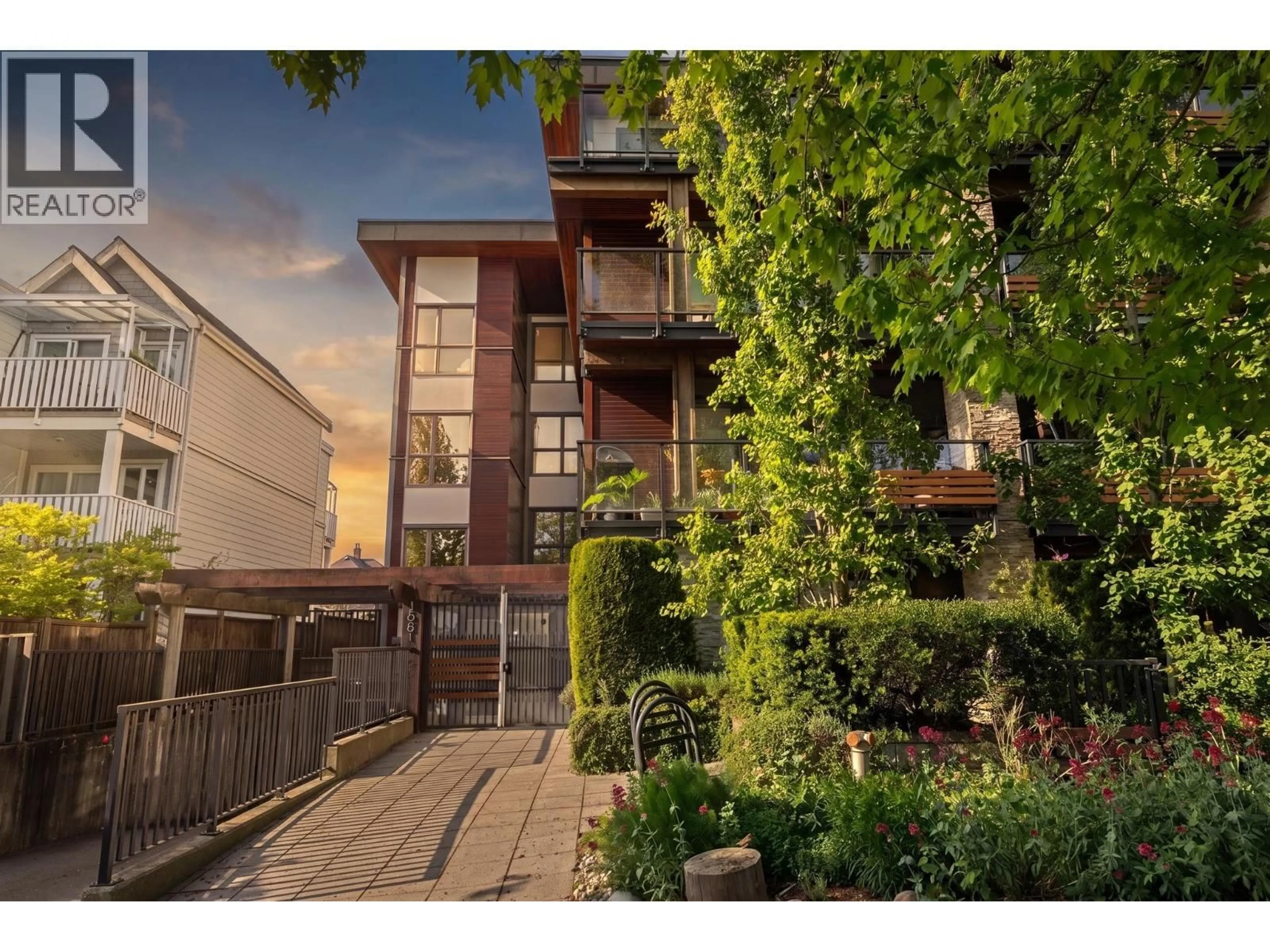 A pic from outside/outdoor area/front of a property/back of a property/a pic from drone, street for 107 - 1661 2ND AVENUE, Vancouver British Columbia V5N1E1
