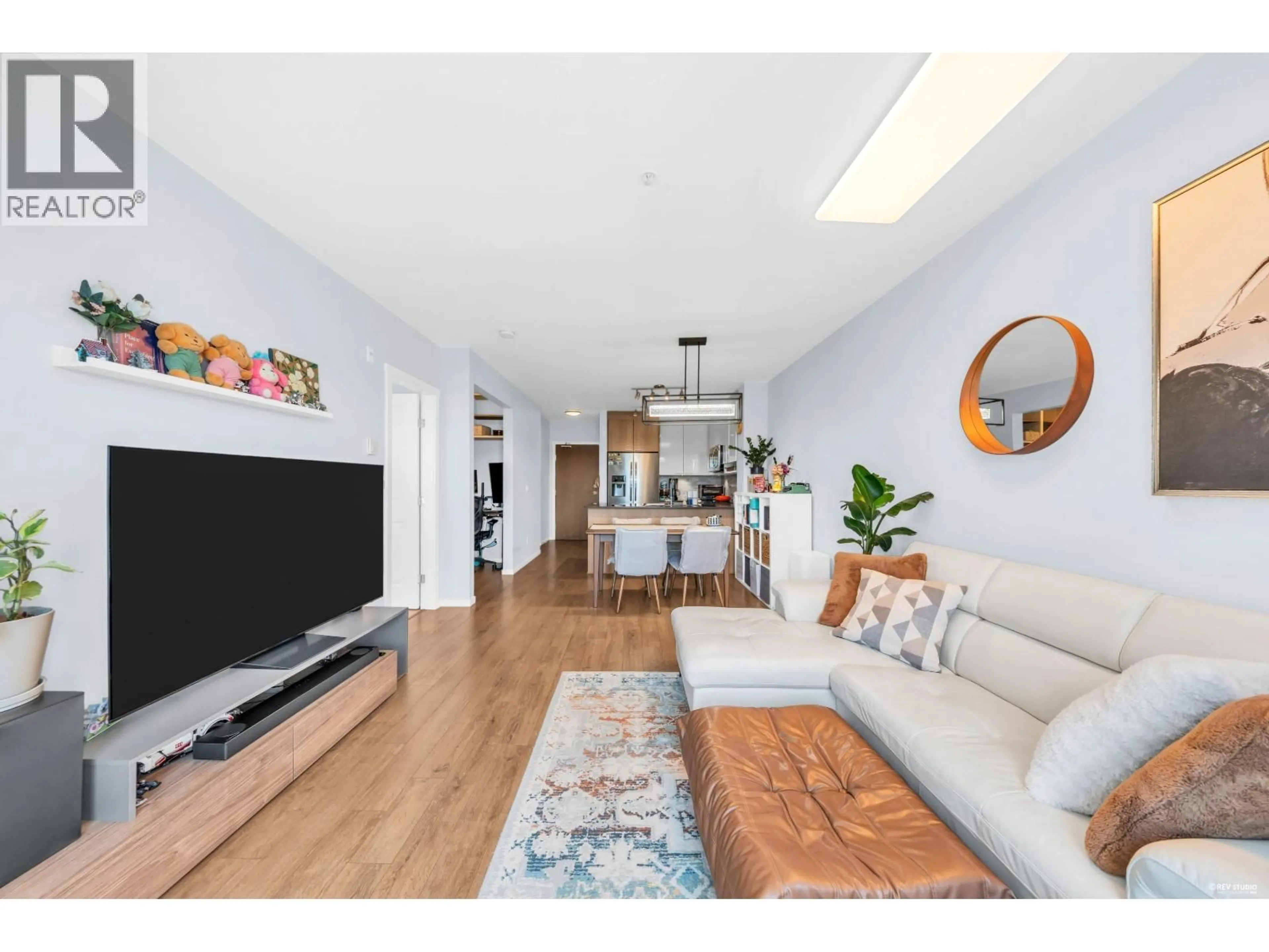 Living room with furniture, wood/laminate floor for 305 - 202 LEBLEU STREET, Coquitlam British Columbia V3K4L6