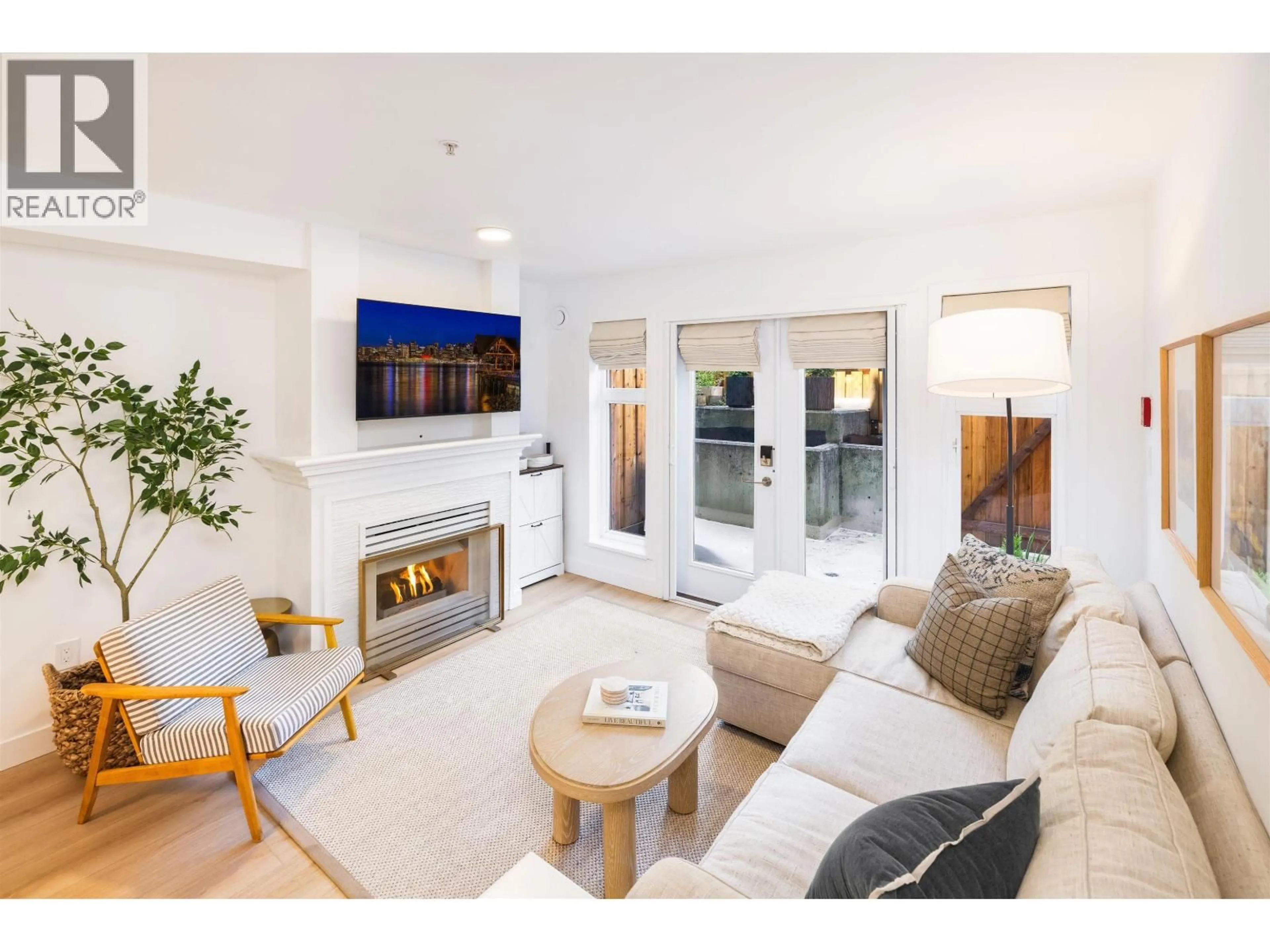 Living room with furniture, unknown for 235 - 2565 BROADWAY, Vancouver British Columbia V6K2E9