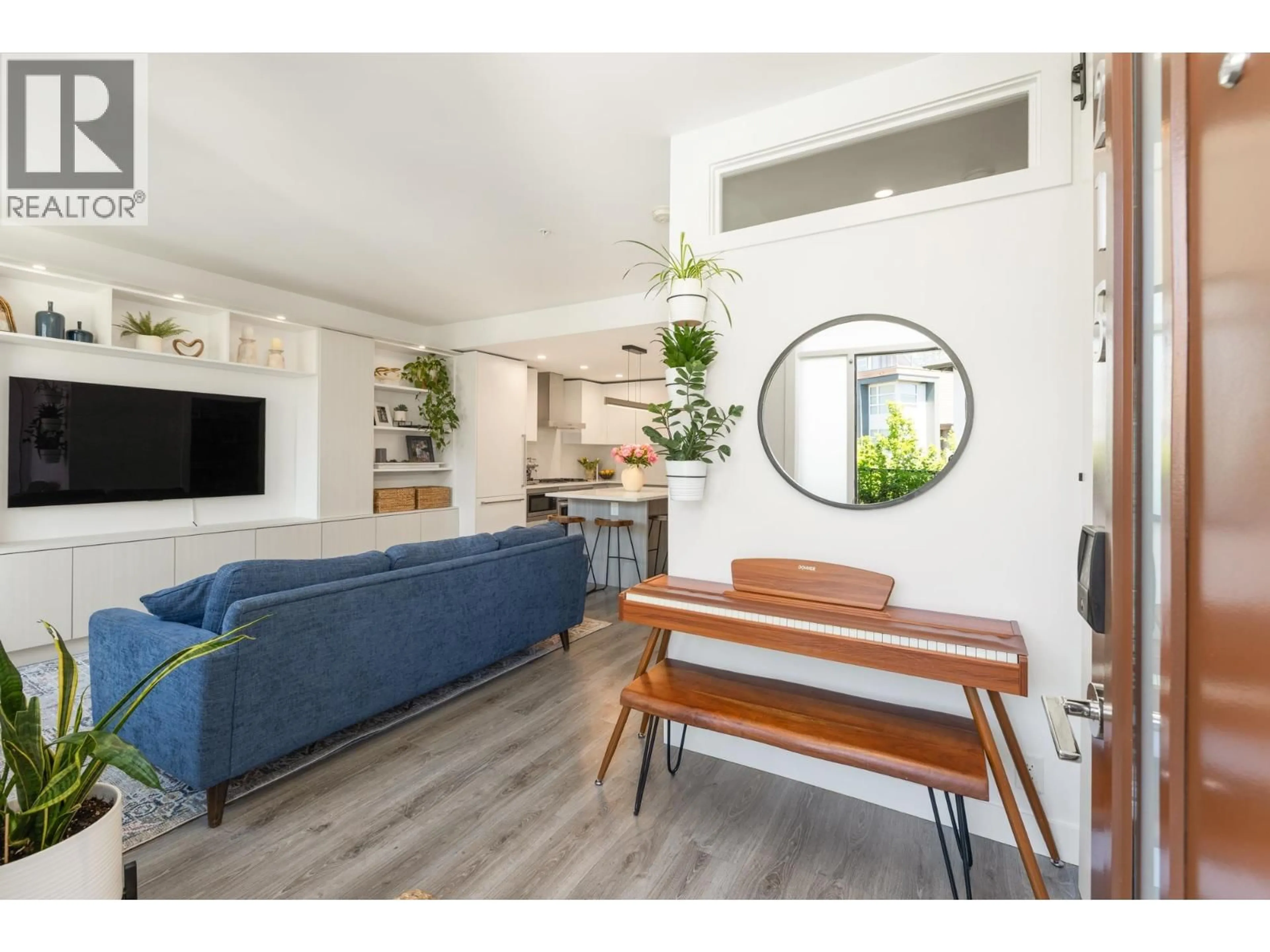 Living room with furniture, unknown for 215 - 2060 CURLING ROAD, North Vancouver British Columbia V7P0E1