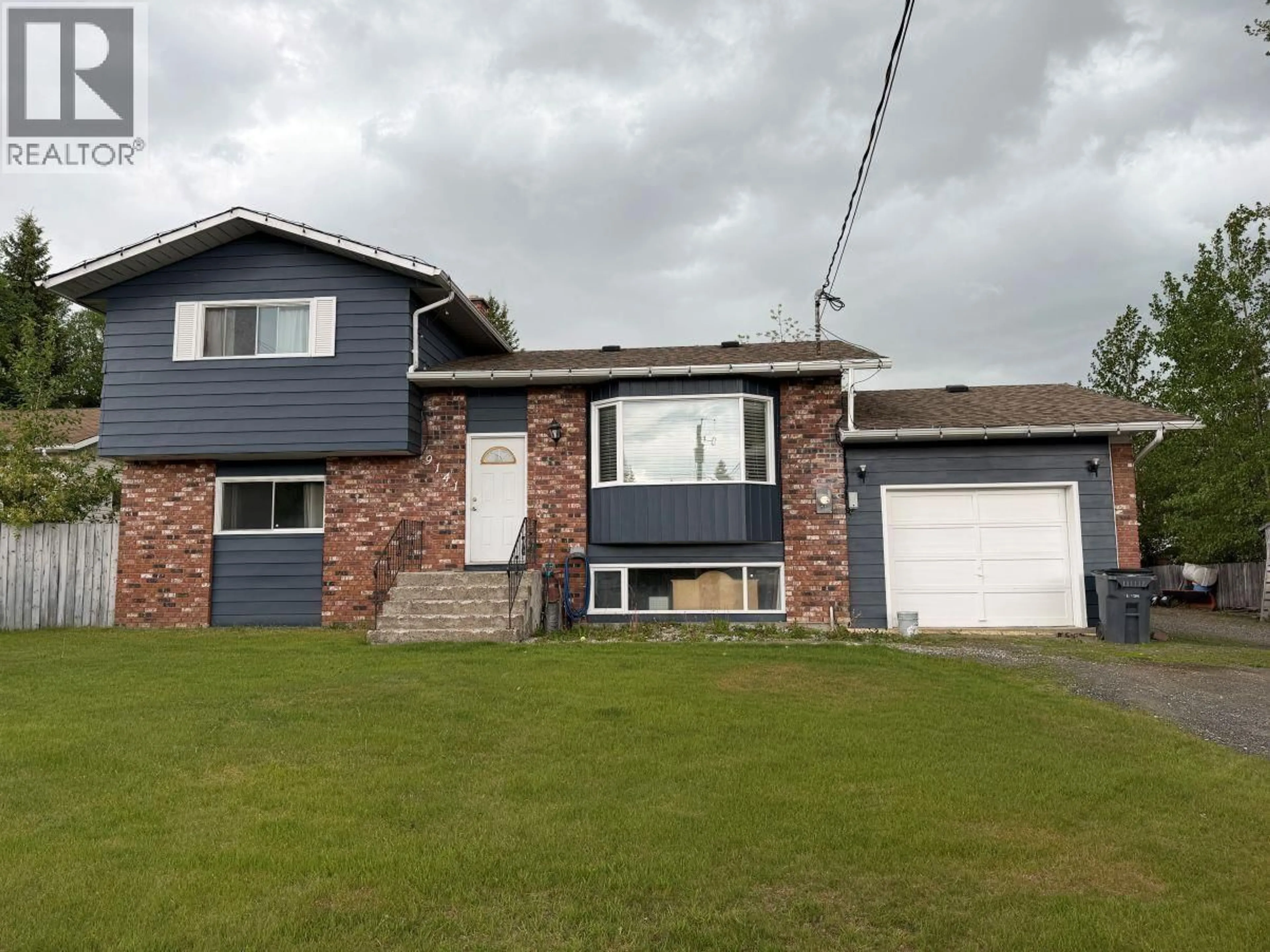 Home with vinyl exterior material, street for 9141 VIKING ROAD, Prince George British Columbia V2K5T7