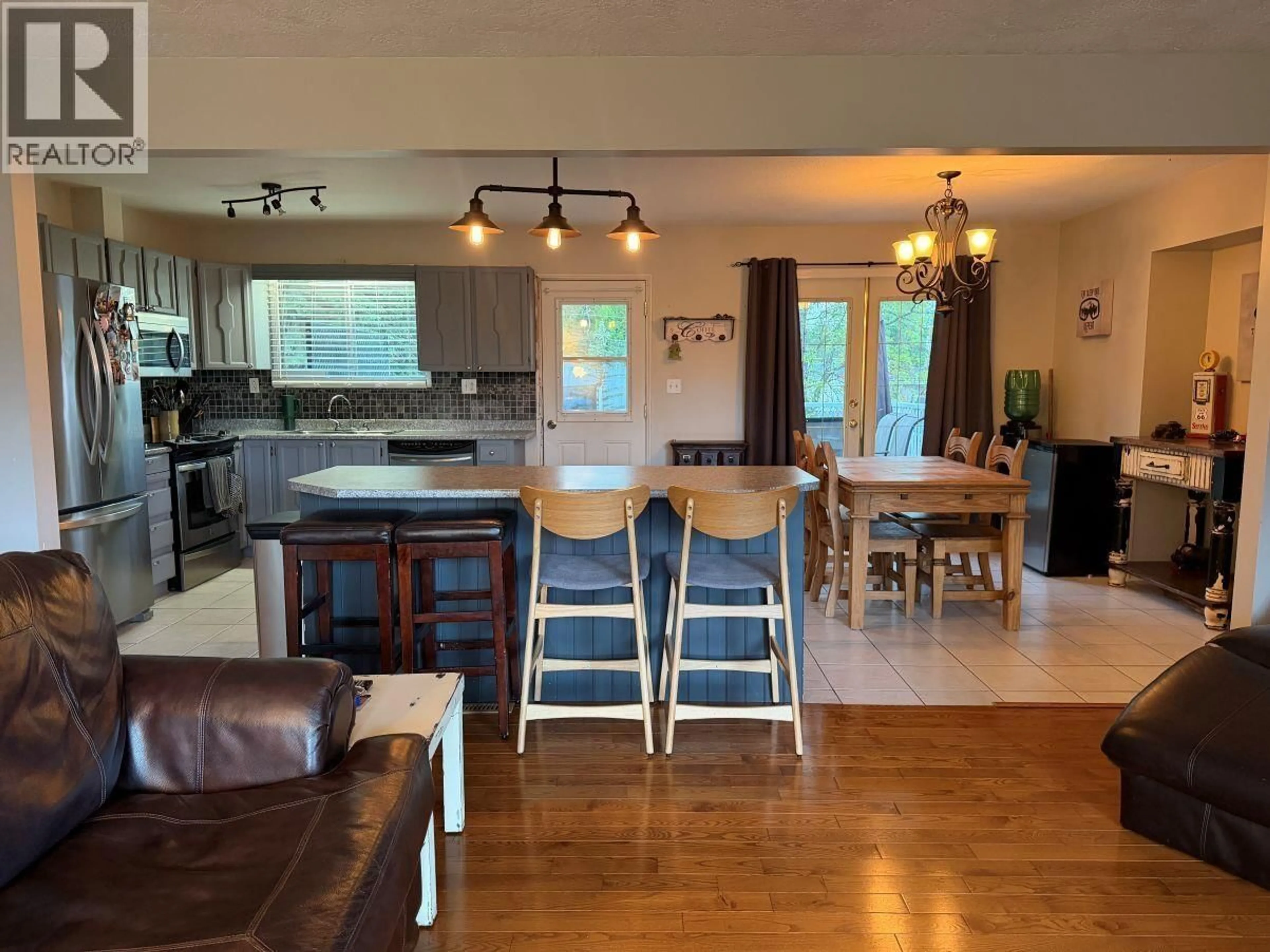 Open concept kitchen, wood/laminate floor for 9141 VIKING ROAD, Prince George British Columbia V2K5T7