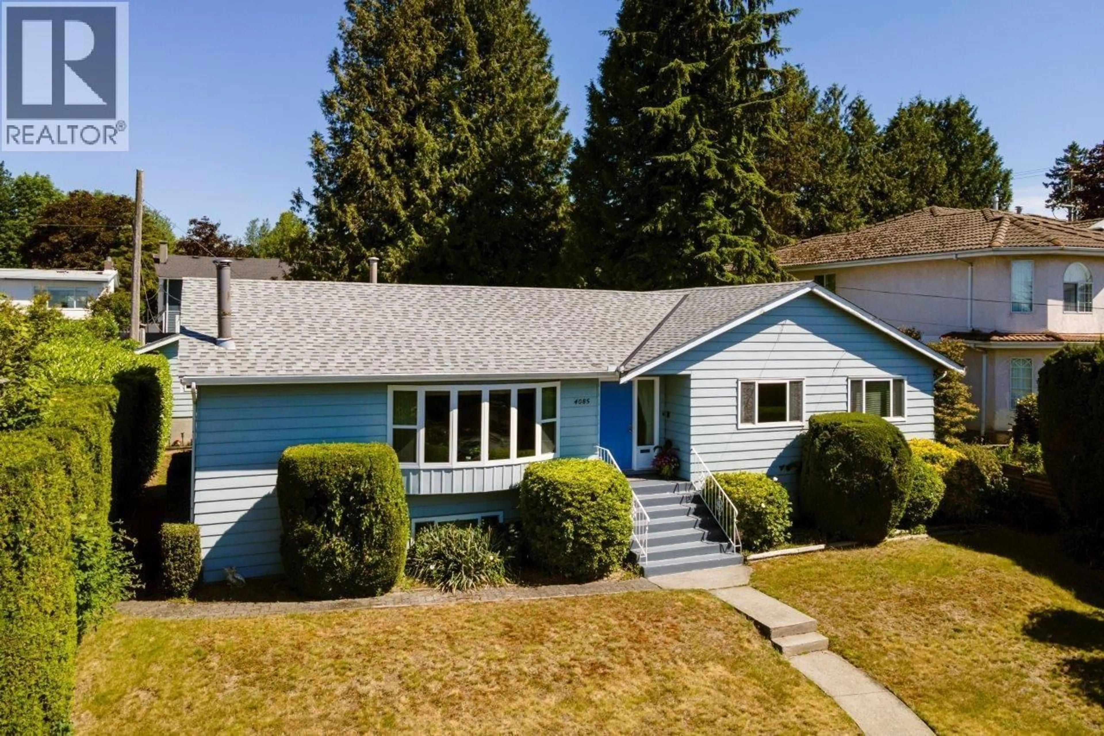Home with vinyl exterior material, street for 4085 RUMBLE STREET, Burnaby British Columbia V5J1Z7