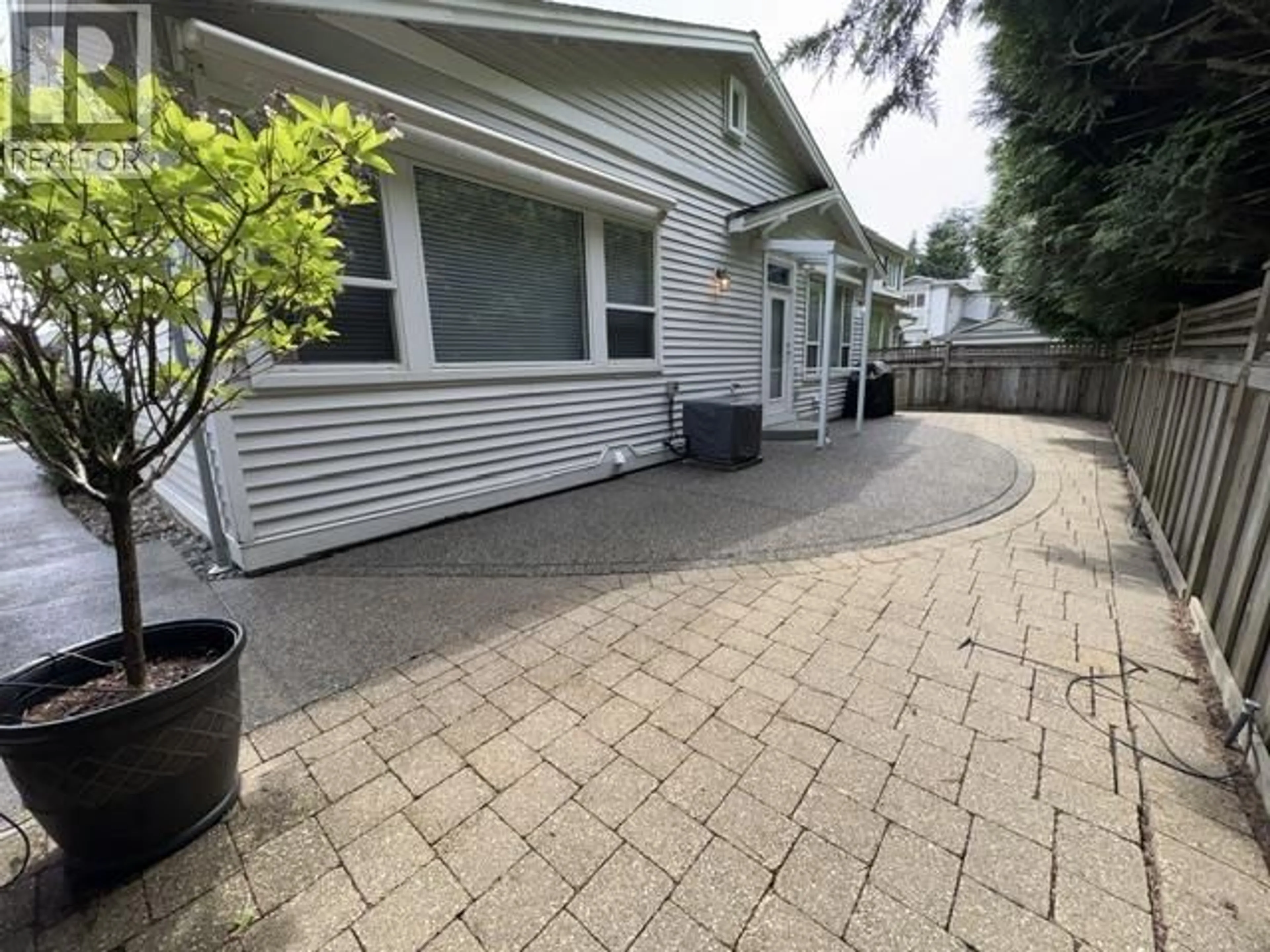A pic from outside/outdoor area/front of a property/back of a property/a pic from drone, street for 139 - 19639 MEADOW GARDENS WAY, Pitt Meadows British Columbia V3Y2T5