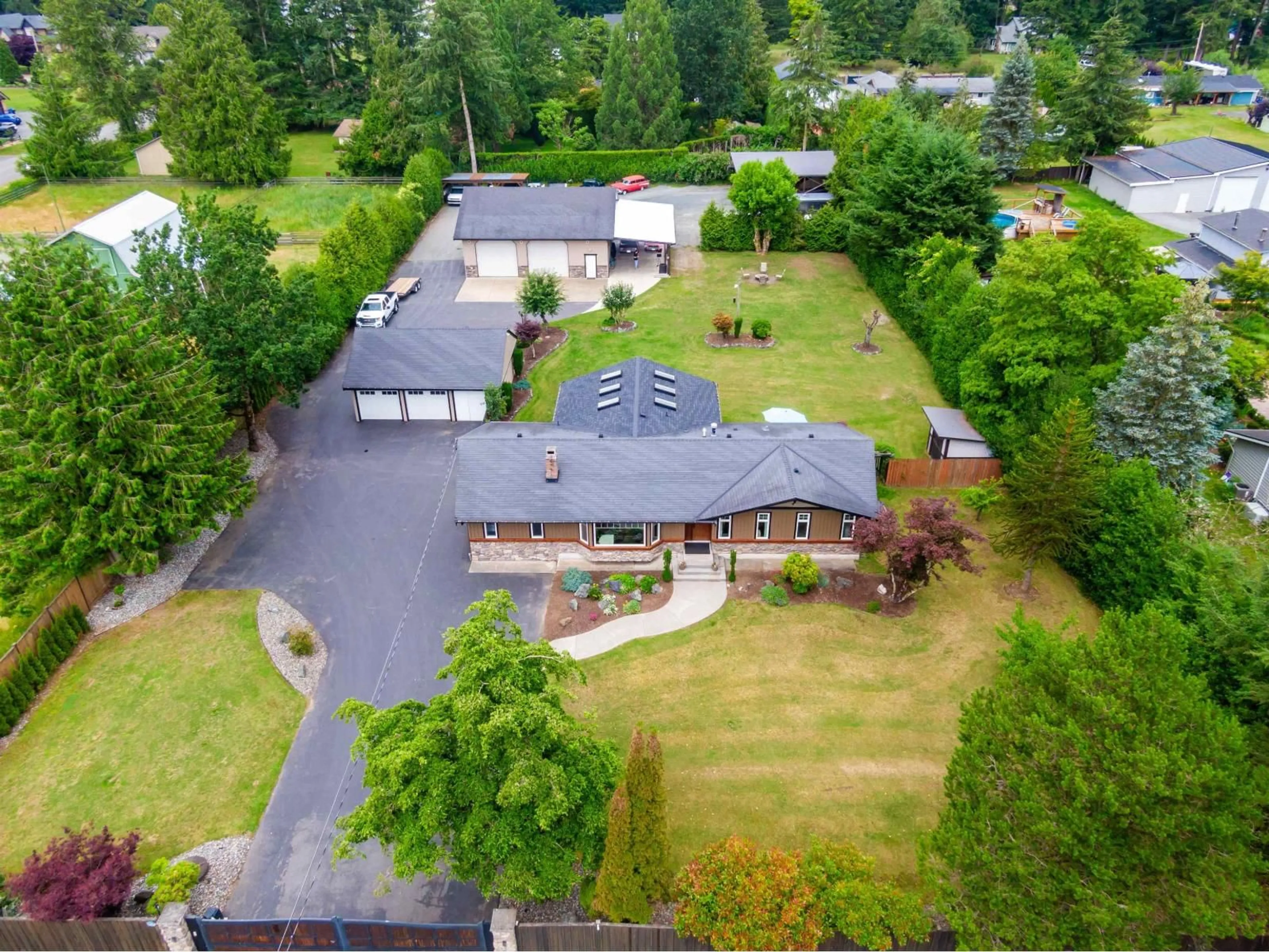 A pic from outside/outdoor area/front of a property/back of a property/a pic from drone, unknown for 24645 50 AVENUE, Langley British Columbia V2Z1E4