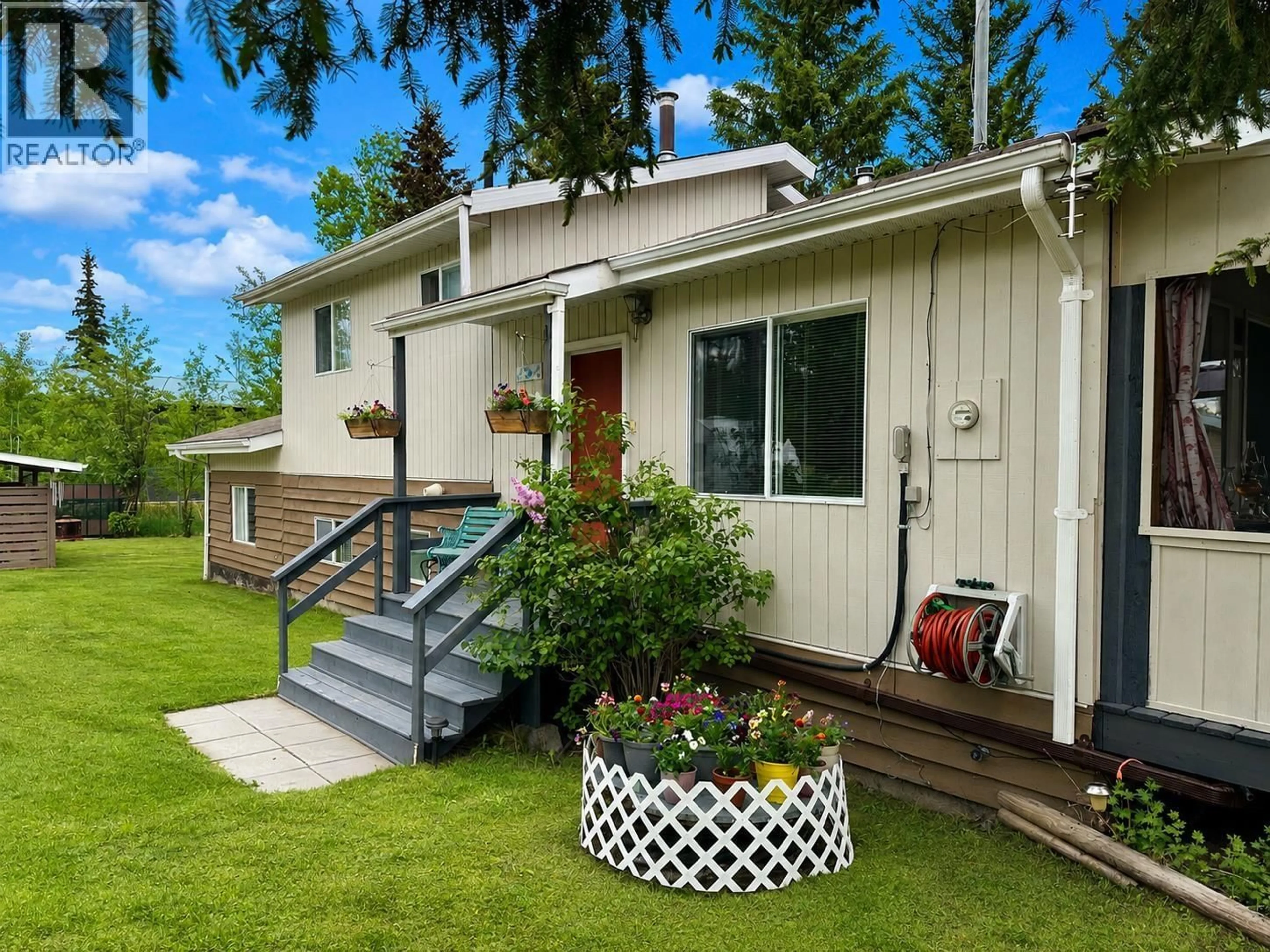 Home with vinyl exterior material, street for 6445 LIVINGSTON ROAD, 70 Mile House British Columbia V0K2K1