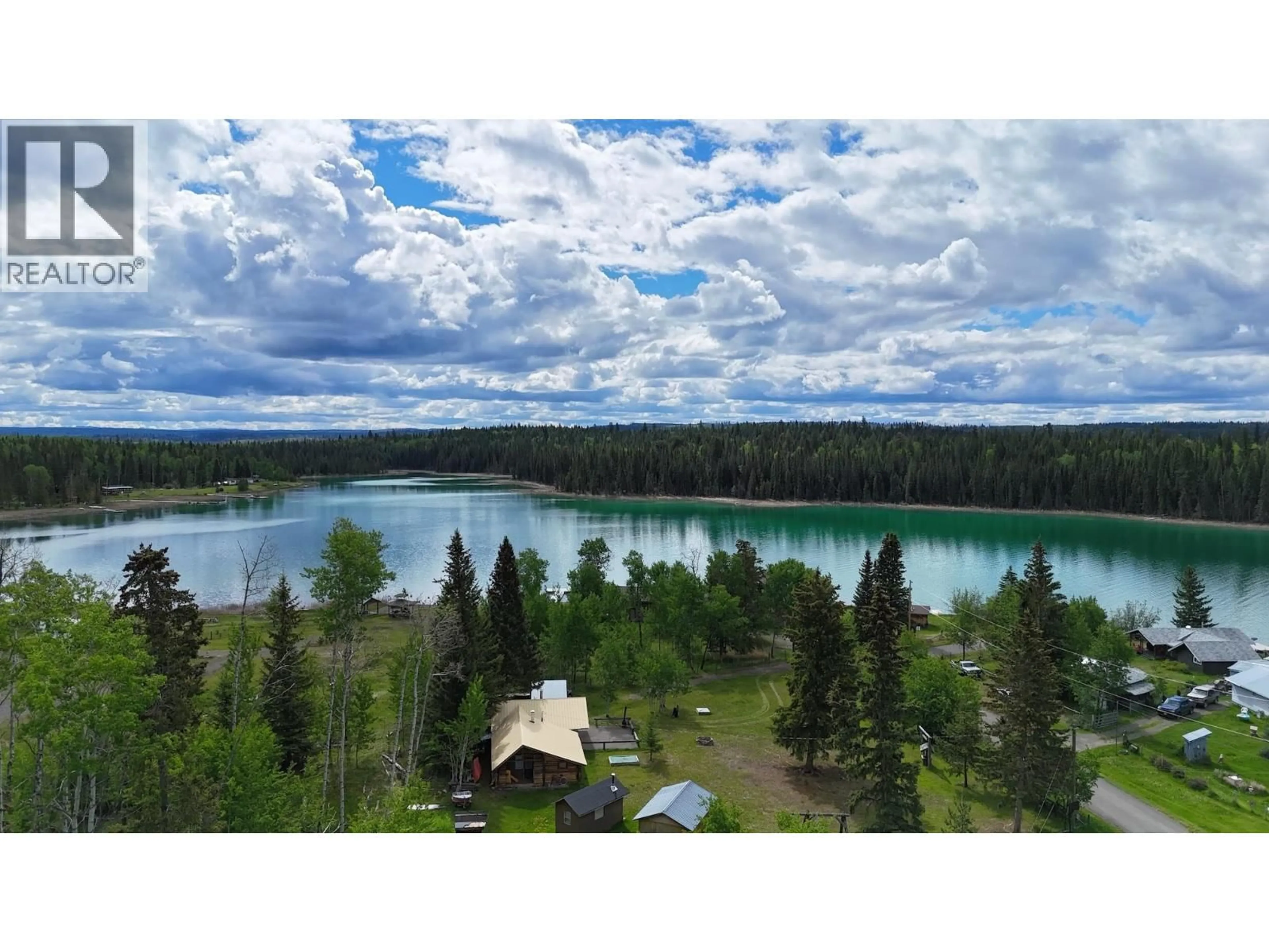 A pic from outside/outdoor area/front of a property/back of a property/a pic from drone, water/lake/river/ocean view for 6445 LIVINGSTON ROAD, 70 Mile House British Columbia V0K2K1