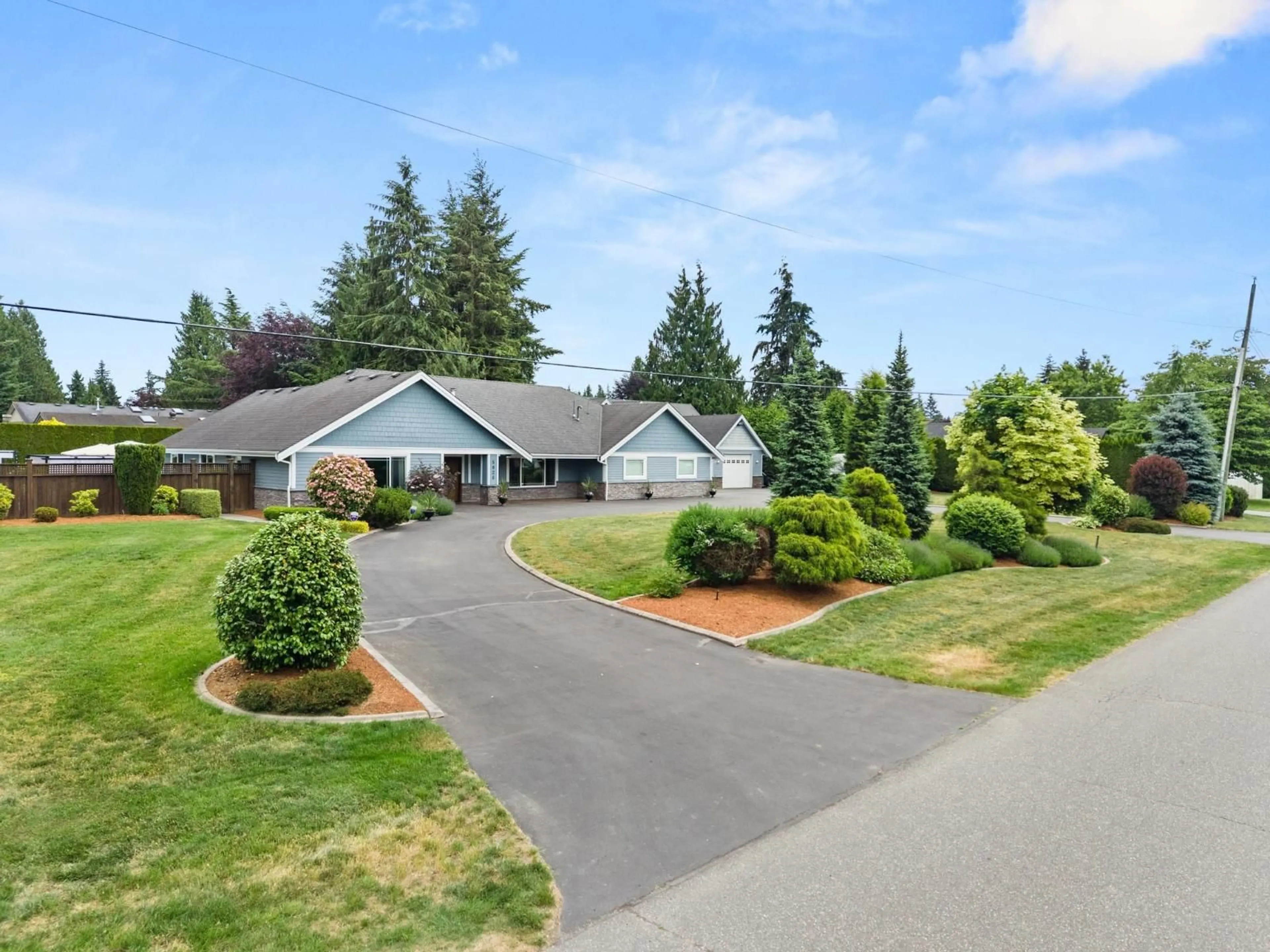A pic from outside/outdoor area/front of a property/back of a property/a pic from drone, street for 5826 246 STREET, Langley British Columbia V2Z1H1