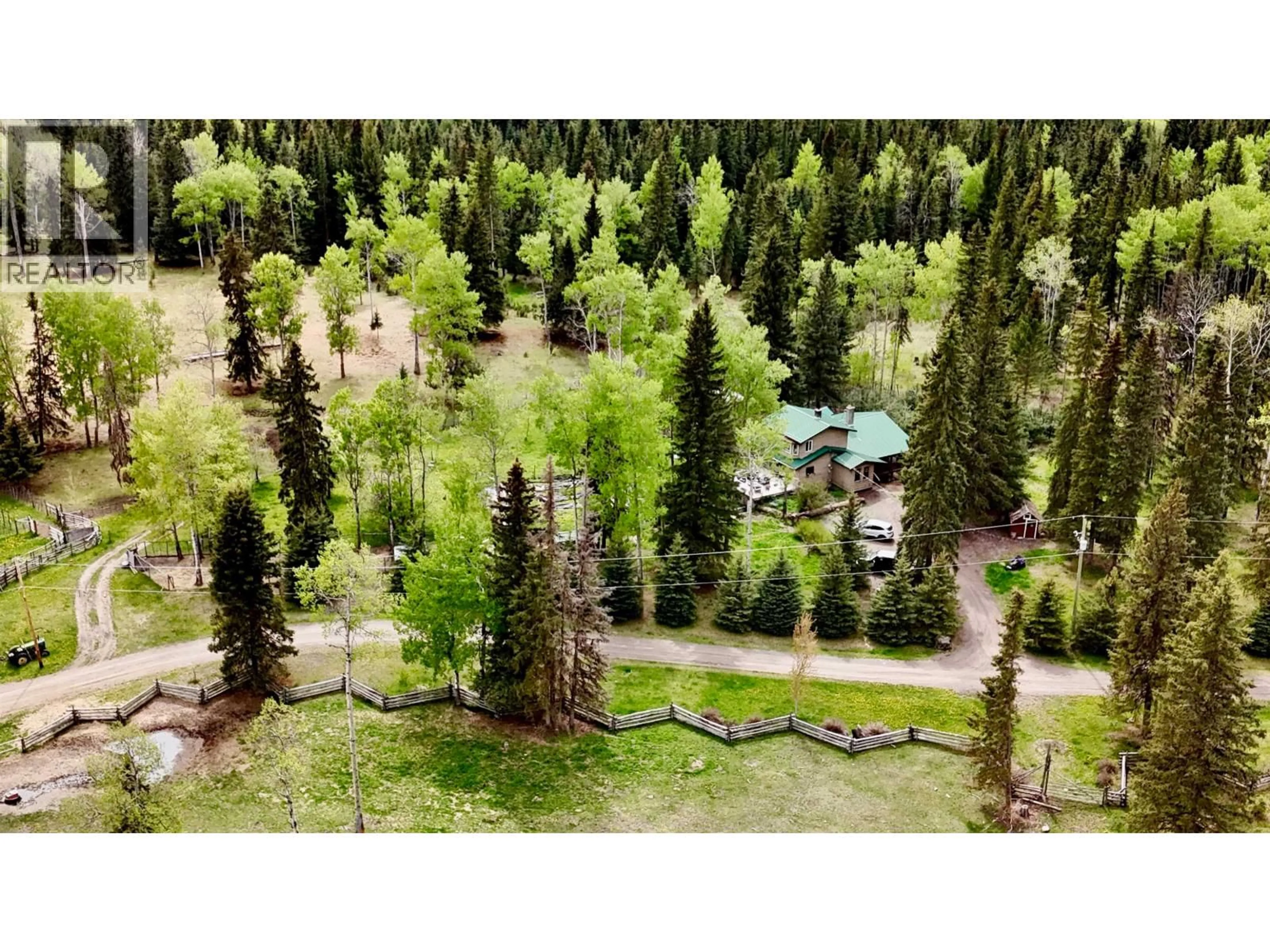 A pic from outside/outdoor area/front of a property/back of a property/a pic from drone, forest/trees view for 6310 HORSE LAKE ROAD, 100 Mile House British Columbia V0K2E3