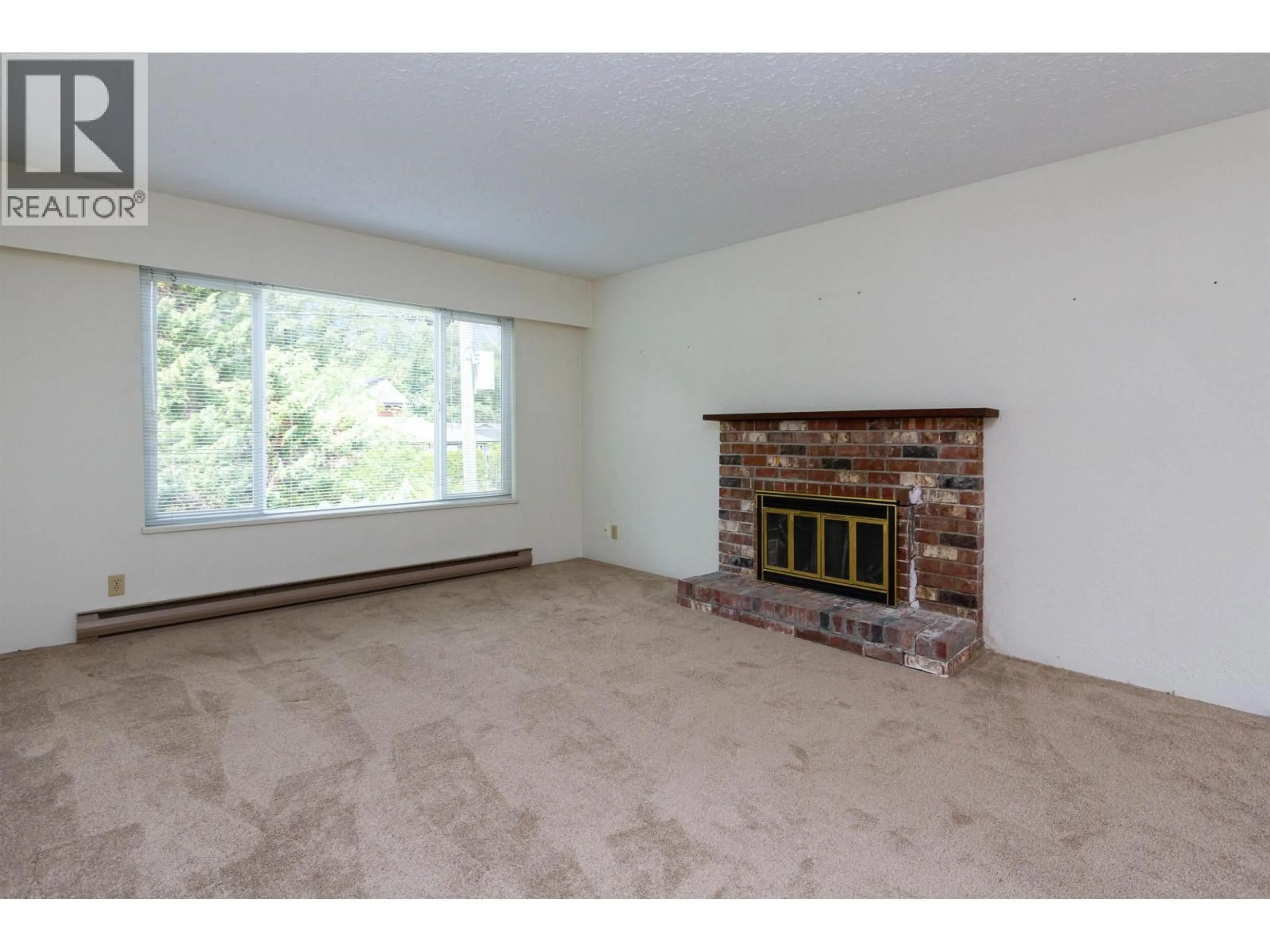 Living room with furniture, carpet floor for 41818 BIRKEN ROAD, Squamish British Columbia V0N1H0