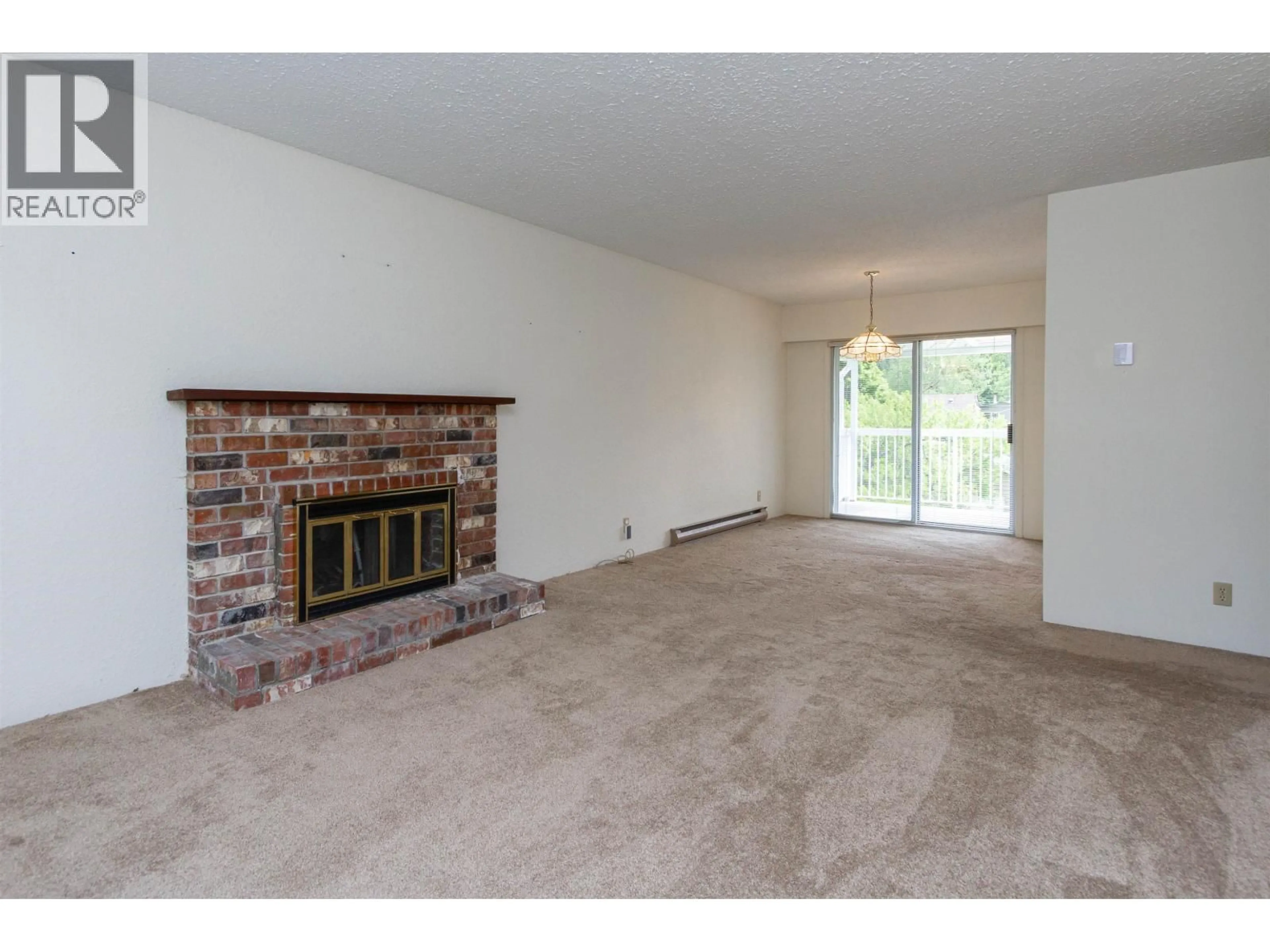 Living room with furniture, carpet floor for 41818 BIRKEN ROAD, Squamish British Columbia V0N1H0
