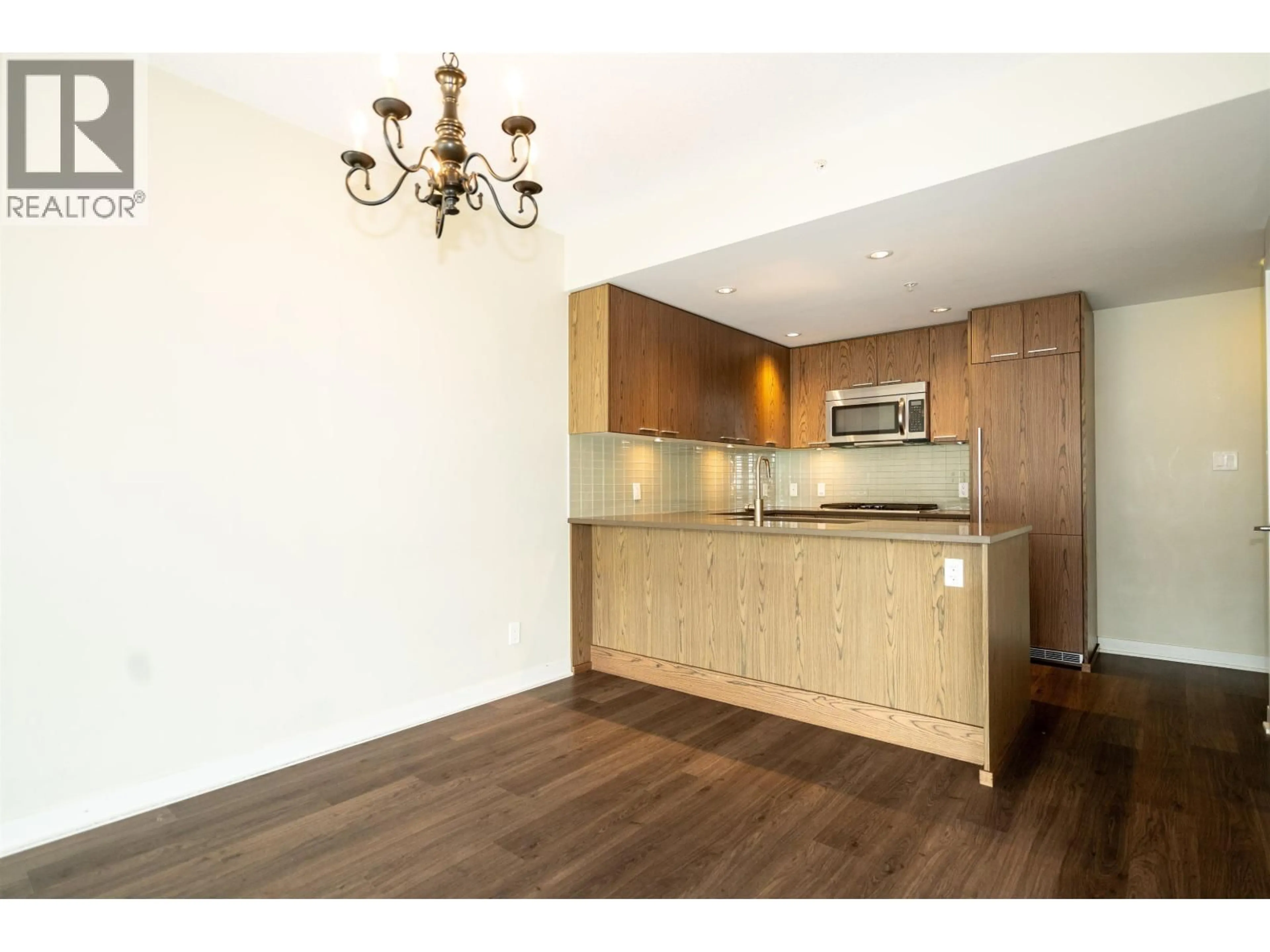 Open concept kitchen, wood/laminate floor for 1605 - 2975 ATLANTIC AVENUE, Coquitlam British Columbia V3B0C5