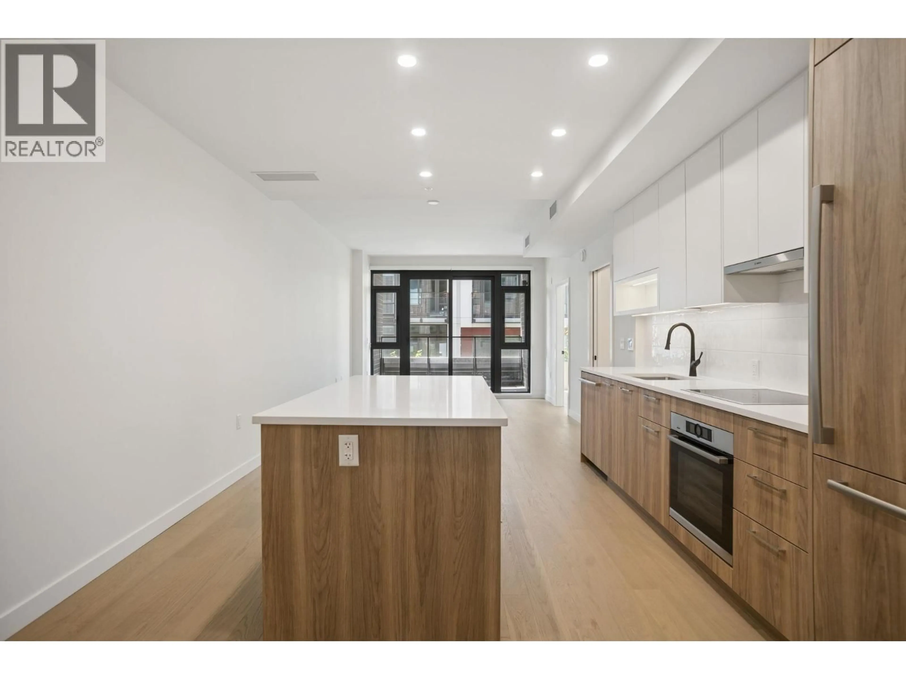 Open concept kitchen, unknown for 204 - 8398 OAK STREET, Vancouver British Columbia V6P0L9